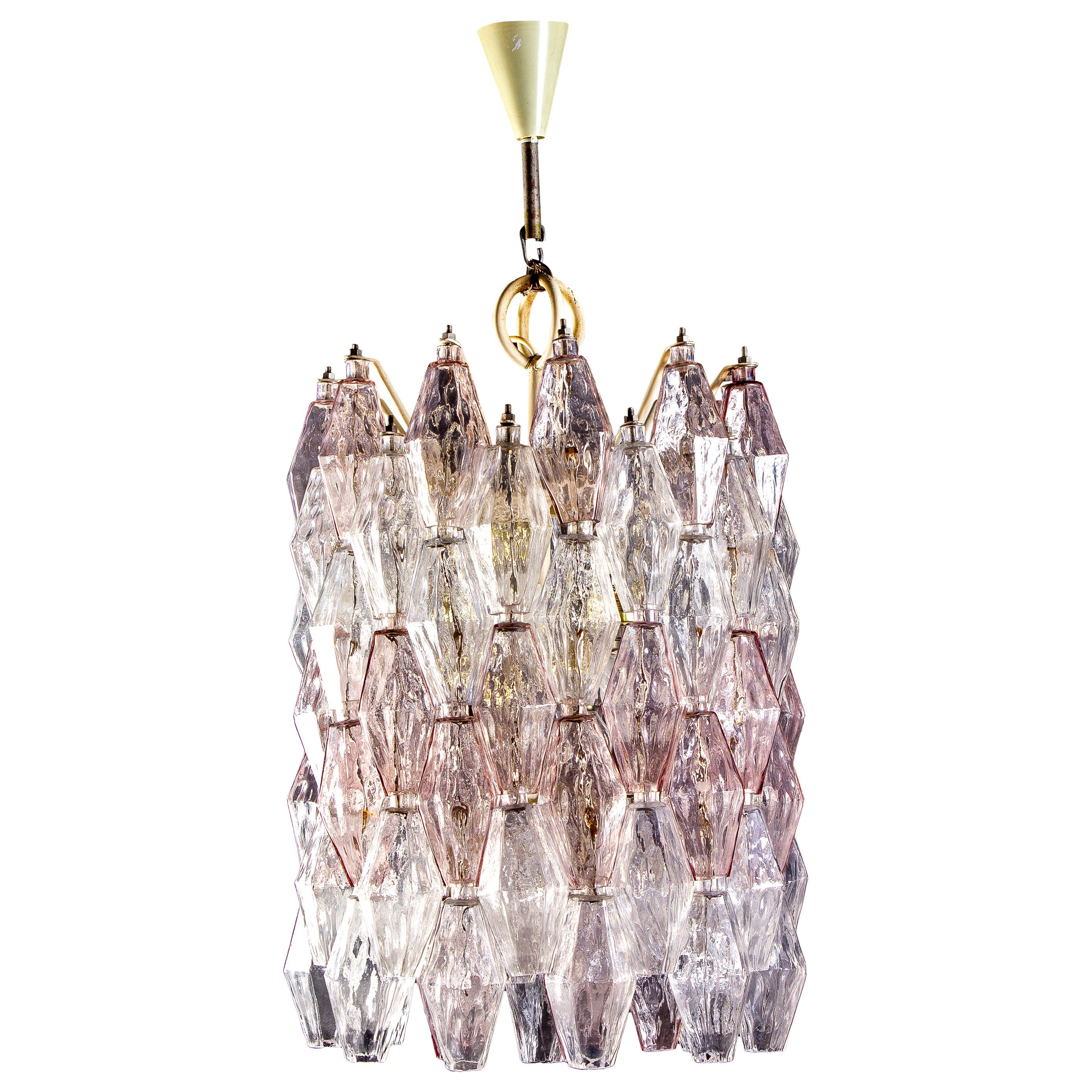 Fabulous original Venini Poliedri chandelier by Carlo Scarpa. Rare combination of light pink and Ice colored Murano glass.
Ivory painted frame in very good original condition.
      