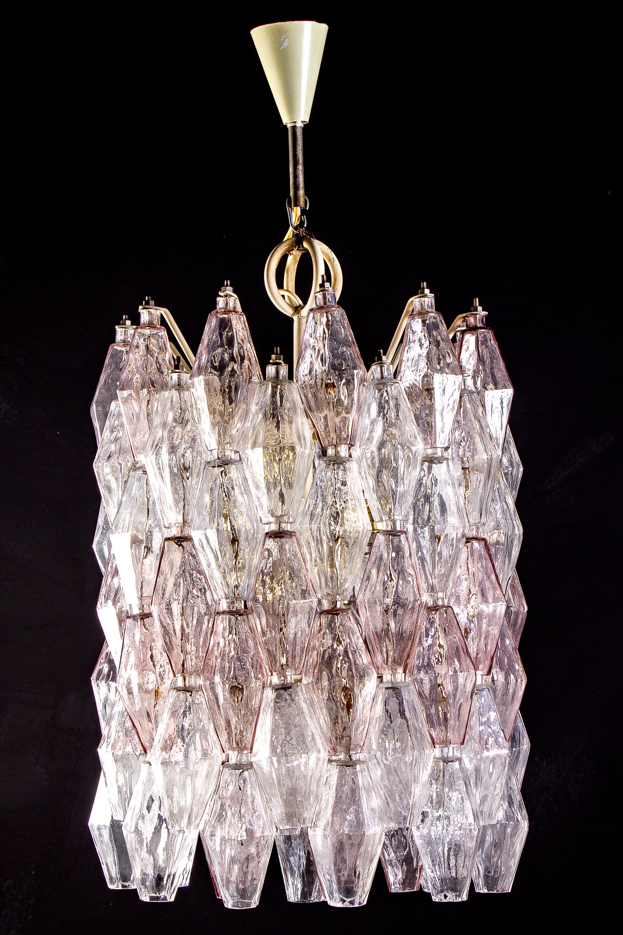 Fabulous original Venini Poliedri chandelier by Carlo Scarpa. Rare combination of light pink and Ice colored Murano glass.
Ivory painted frame in very good original condition.
 