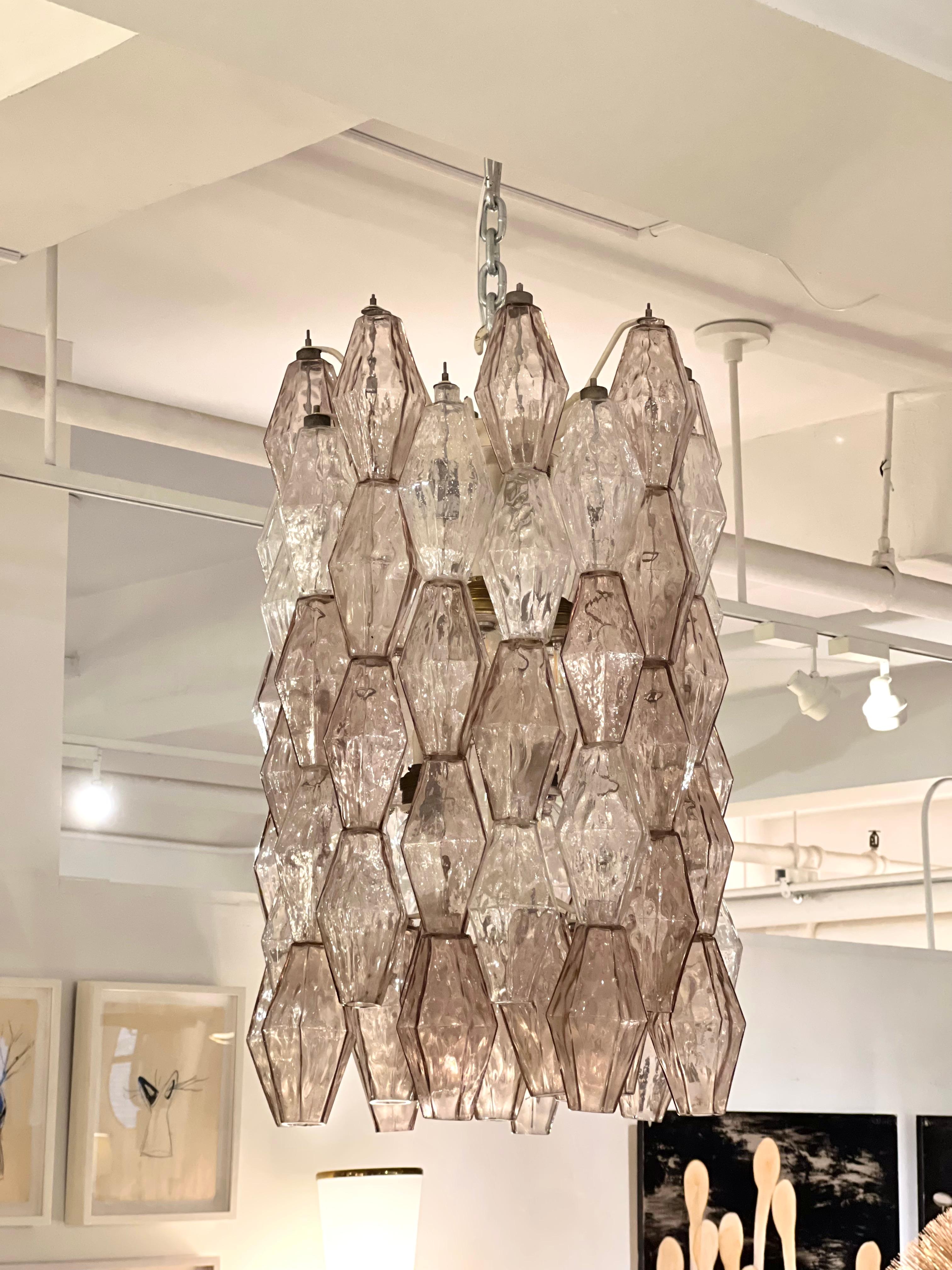 Venini Polyhedral drum shaped chandelier with several tiers of rose and clear crystals. Italy, circa 1950's.
Condition commensurate with age.  Imperfections on a some crystals - Sold AS IS.
