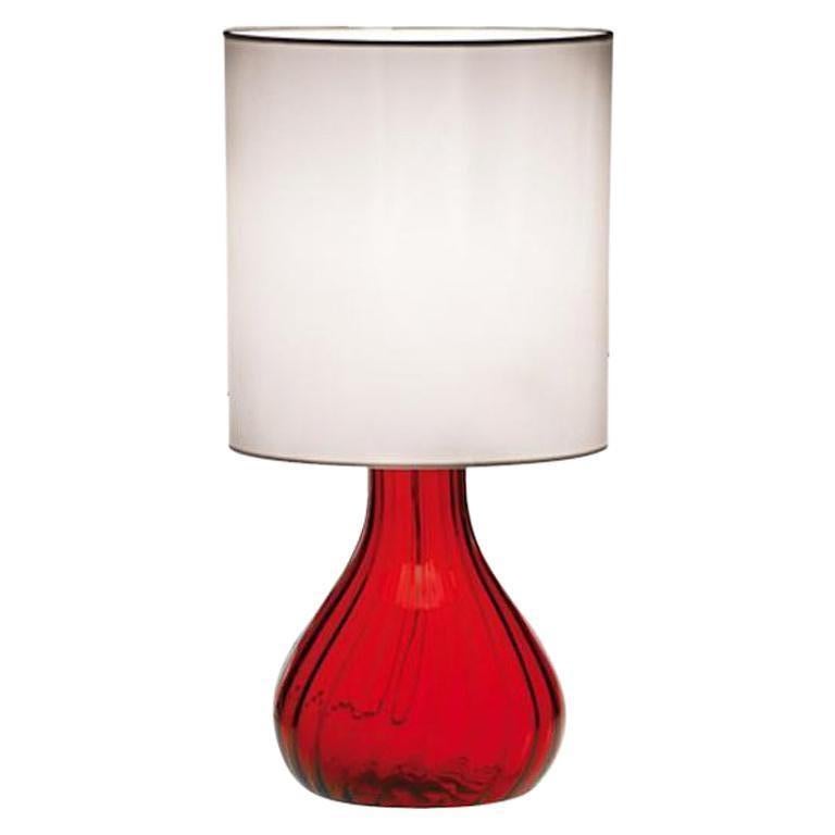 Seltz table lamp, manufactured by Rodolfo Dordoni and manufactured by Venini, features an handmade blown glass body made with the Rigadin technique. Shade in white fabric. Available in two different sizes. Indoor use only.

Dimensions: Ø 30 cm, H