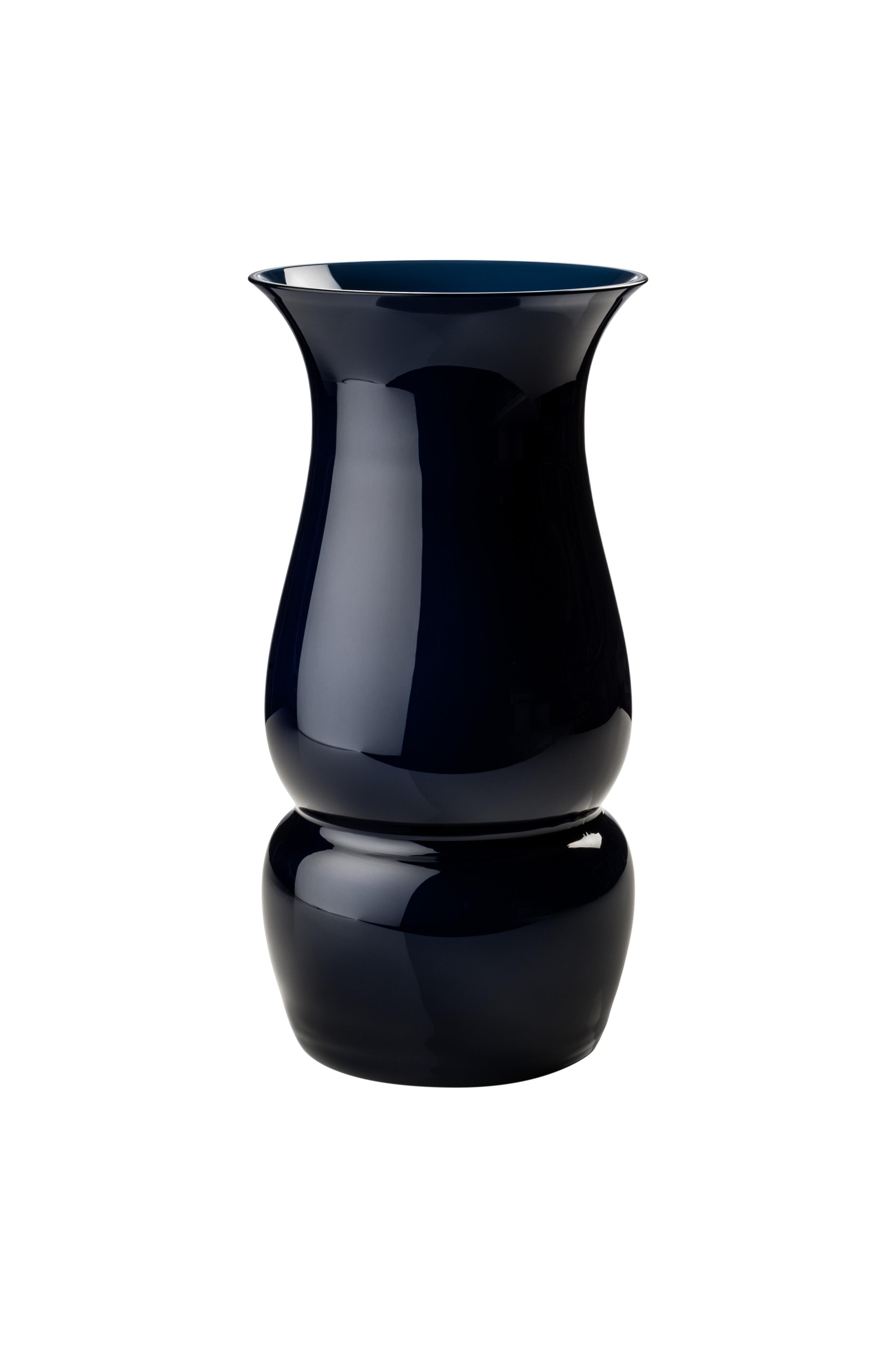 Venini glass vase with elongated body and funnel shaped neck in marine blue designed by Leonardo Lanucci in 2016. Perfect for indoor home decor as container or strong statement piece for any room. Also available in other colors on