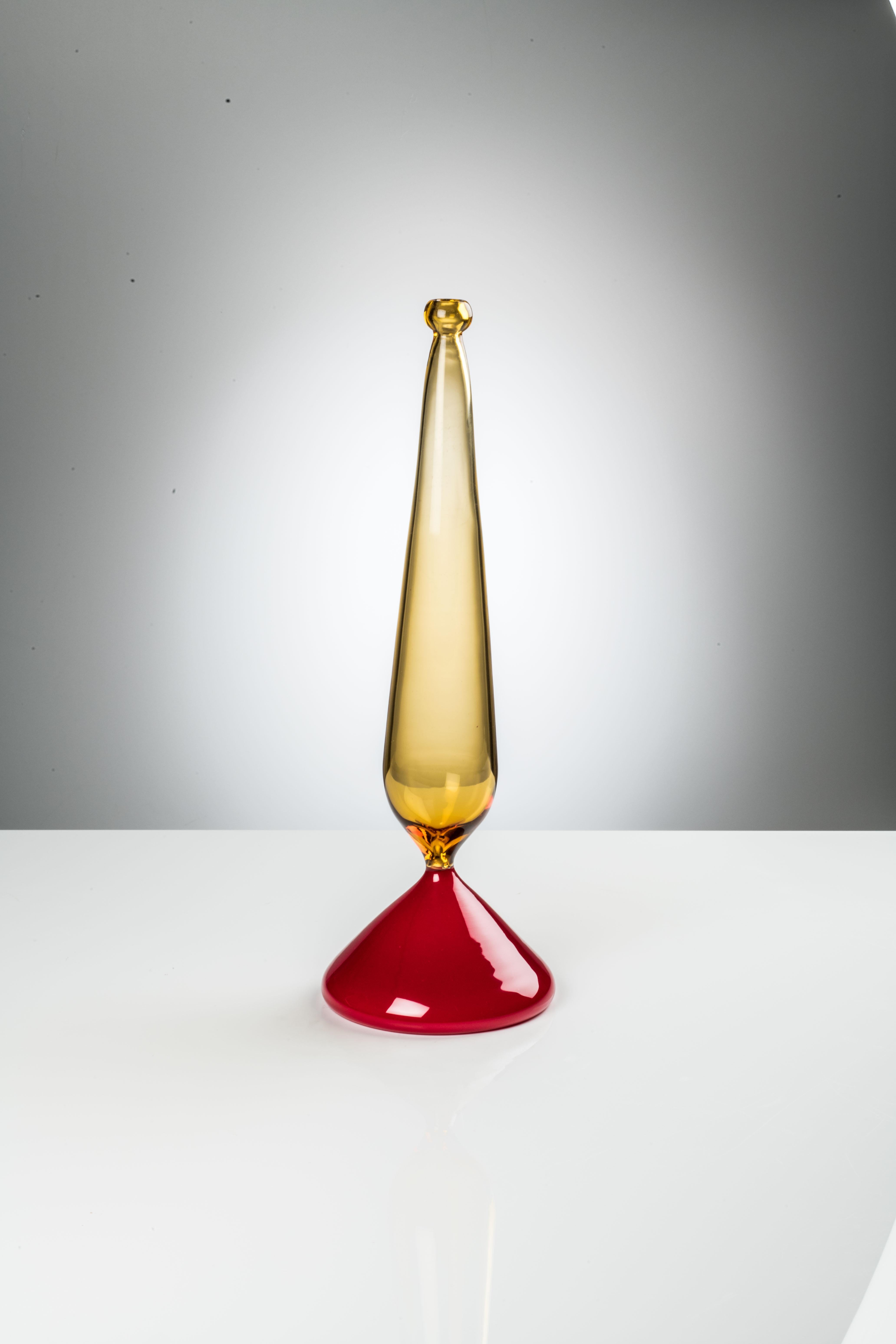 Rio glass sculptures, designed by Monica Giggisberg and Philip Baldwin and manufactured by Venini, are available in three different versions: Baritono, Tenore and Soprano. Indoor use only.

Dimensions: Ø 19 cm, H 51 cm.
 