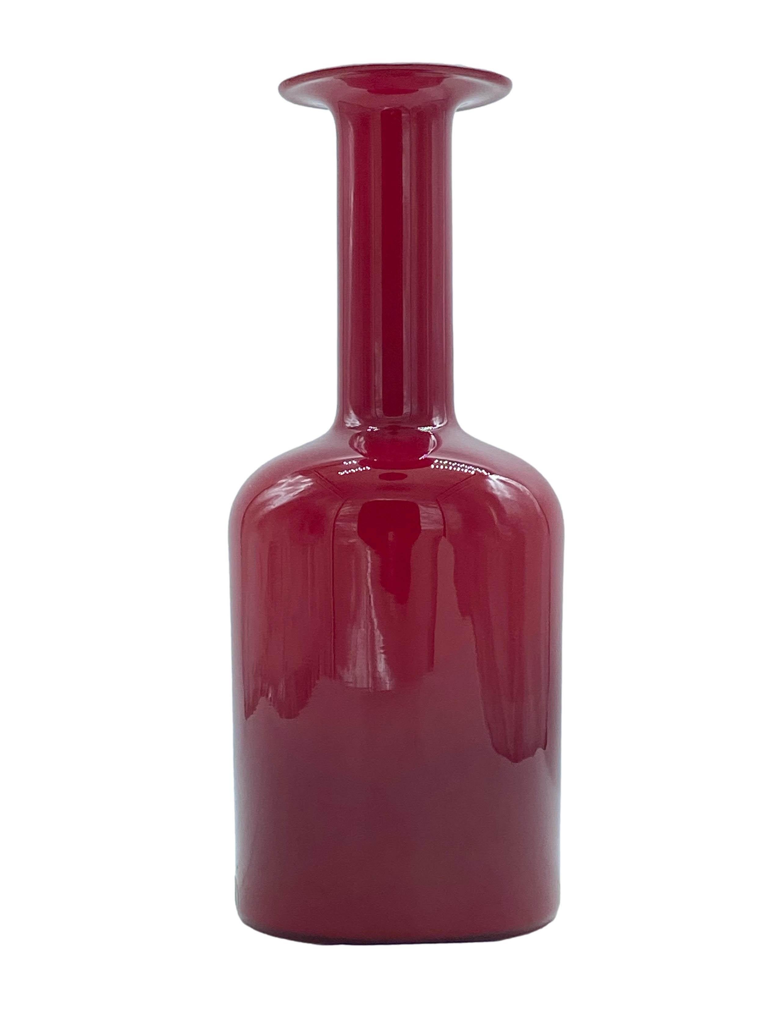 Iconic Scandinavian glass bottle or vase designed by Otto Brauer for Holmegaard, produced in Denmark in the 1960s.