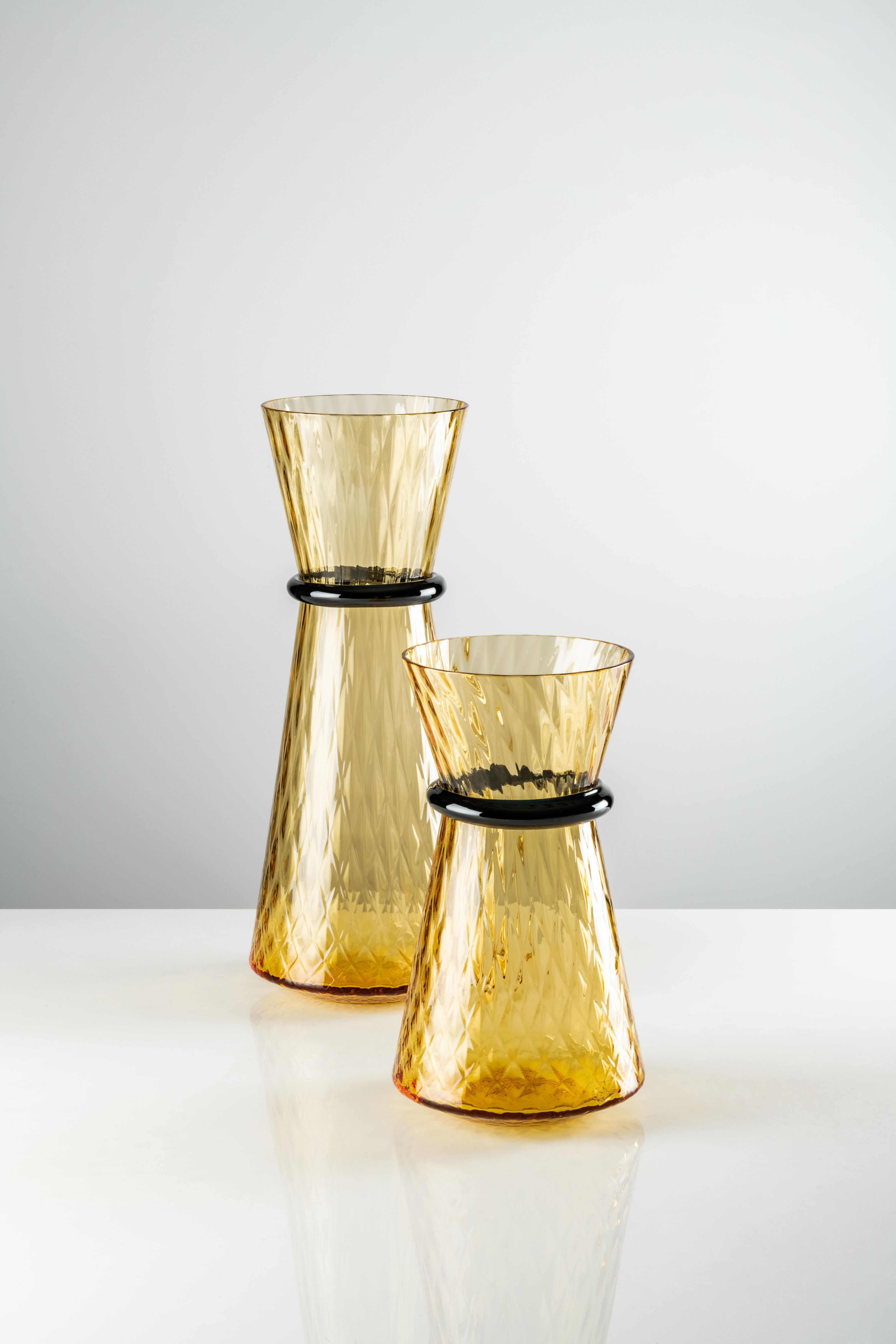Tiara large vase in amber and horizon Murano glass by Francesco Lucchese for Venini. The art of glassmaking meets the endless potential of light. A jewel-like creation that carries an infinite sparkle, precious like gemstones. Francesco Lucchese