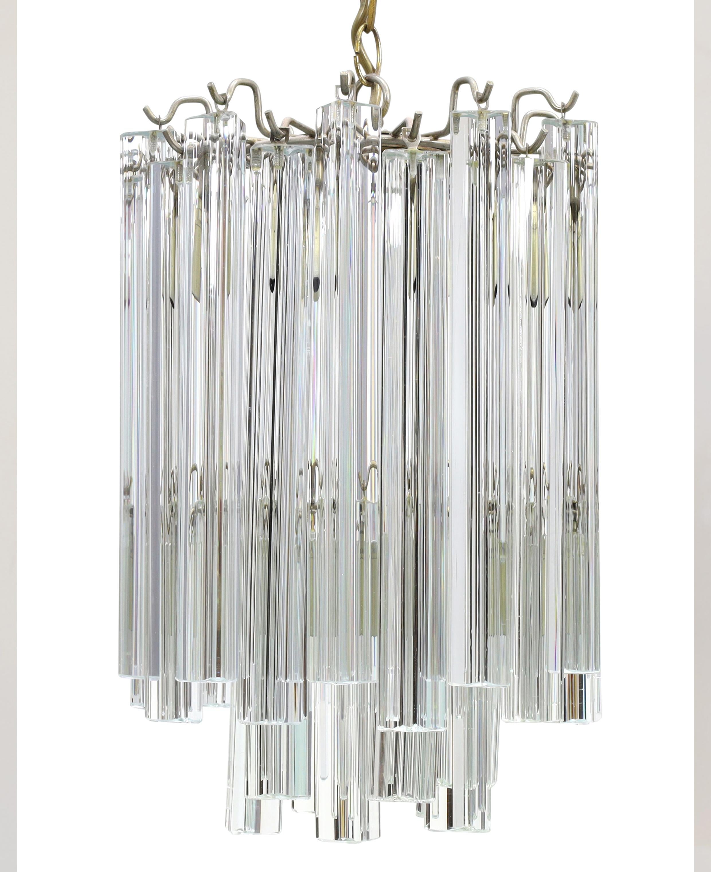 Venini Trilobo Murano glass and steel chandelier circa 1960 Made in Italy

Will require four chandelier bulbs. 

Venini—the world famous Italian glass company—traces it roots to 1921, when Paolo Venini (1895-1959), a Milan lawyer with