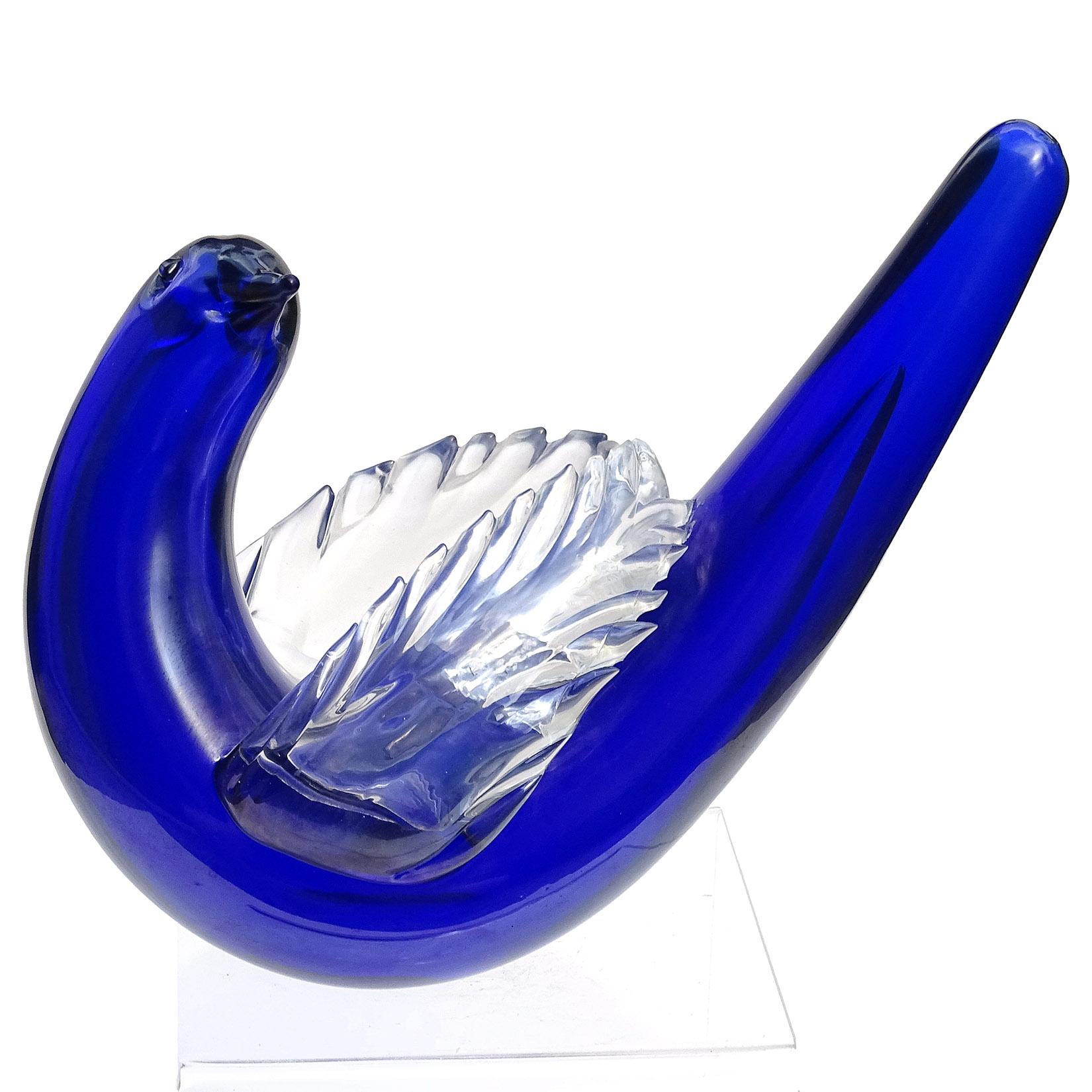 Beautiful, and rare Murano hand blown cobalt blue and clear wings, heavy iridescent Italian art glass bird sculpture. Documented to designer Tyra Lundgren for Venini, circa 1935-1936. Published in the Venini catalogs and books, including Franco