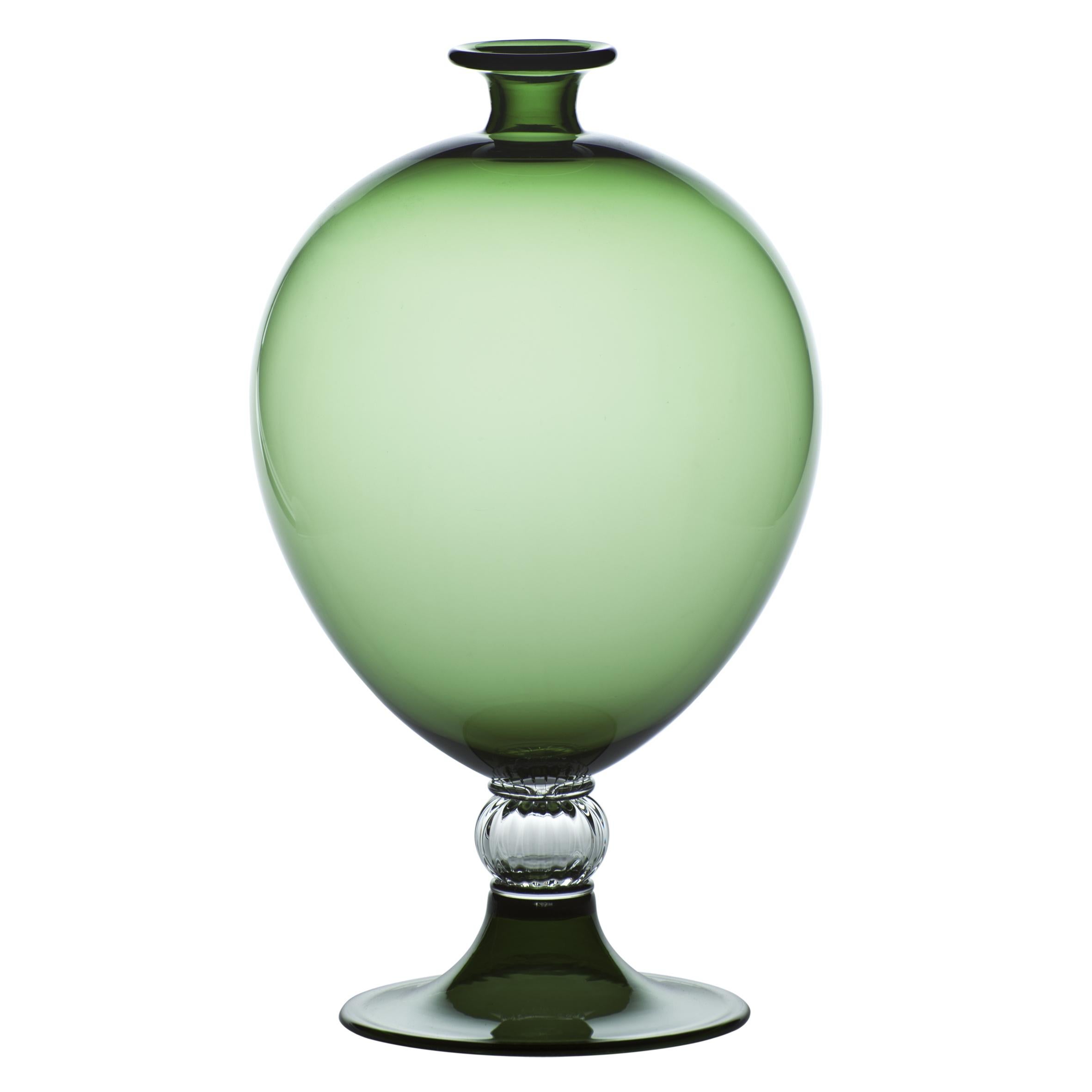 Venini glass vase with cylindrical body and crystal decorative base. Featured in apple green colored class with crystal designed in 1921. Perfect for indoor home decor as container or strong statement piece for any room.

Dimensions: 20 cm