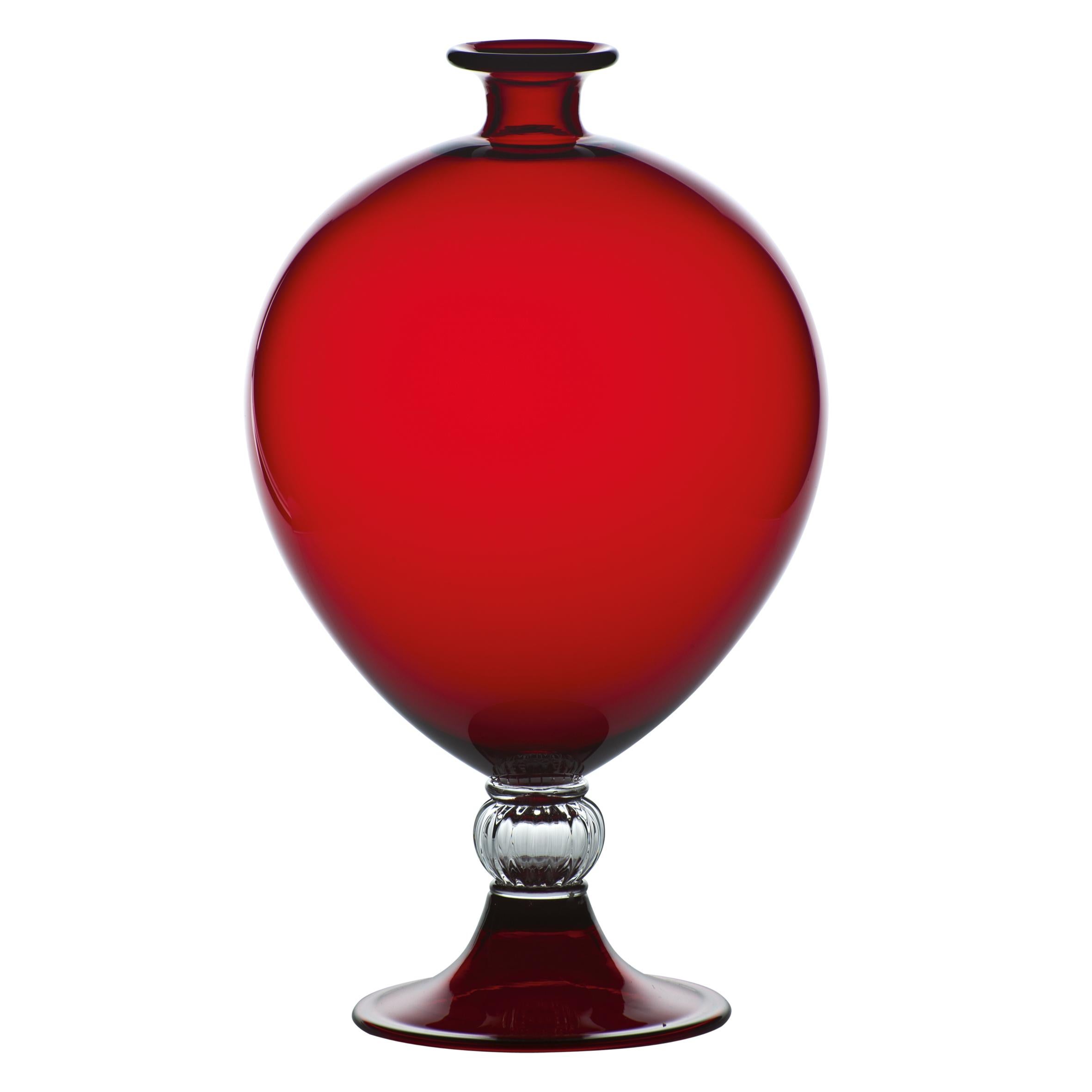 Venini glass vase with cylindrical body and crystal decorative base. Featured in red colored class with crystal designed in 1921. Perfect for indoor home decor as container or strong statement piece for any room.

Dimensions: 20 cm diameter x 32
