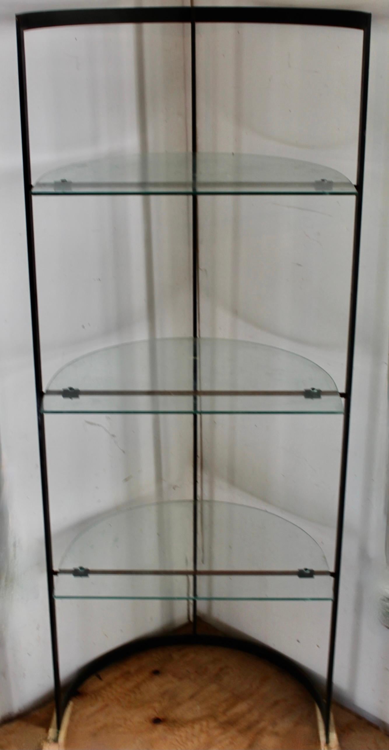 For a 1983 exhibition of Venini glass at The Heller Gallery these unique cases were designed by the Venini company and made in Italy. Three semi-circular glass shelves (22