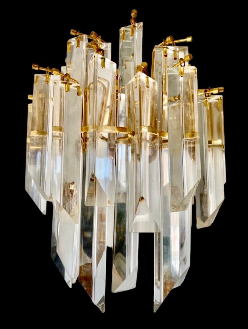 Venini wall lamp in Murano glass with iridium glass. The design and the quality of the glass make this piece the best in design.
This pair of sconces is in good condition.
Venini is an Italian company known for its high quality handcrafted