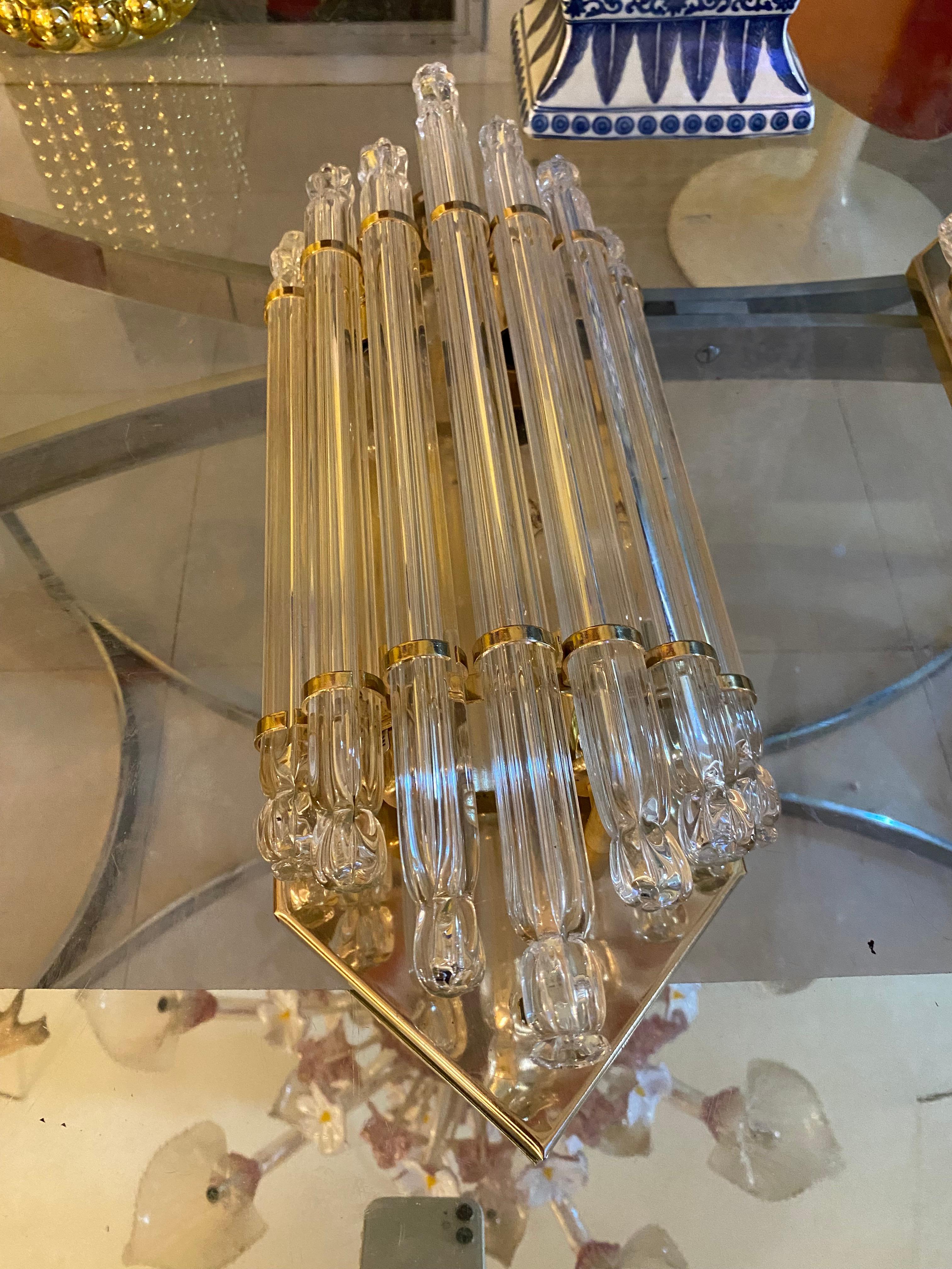 Venini wall lamp in Murano glass with iridium glass. The design and the quality of the glass make this piece the best in design.
This pair of sconces is in good condition.
Venini is an Italian company known for its high quality handcrafted