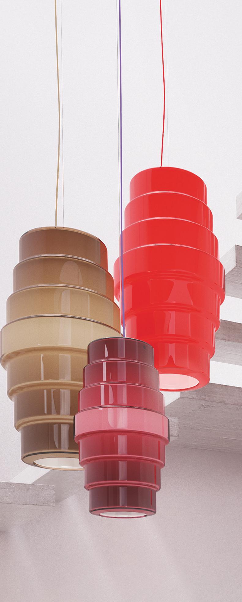 Zoe pendant light in violet shades of glass. Its shape is reminiscent of a lantern and brightens any living space with its bold red color. Also available in other colors, sizes and as a wall sconce or table light.

Light source: Halogen 1 max- 70