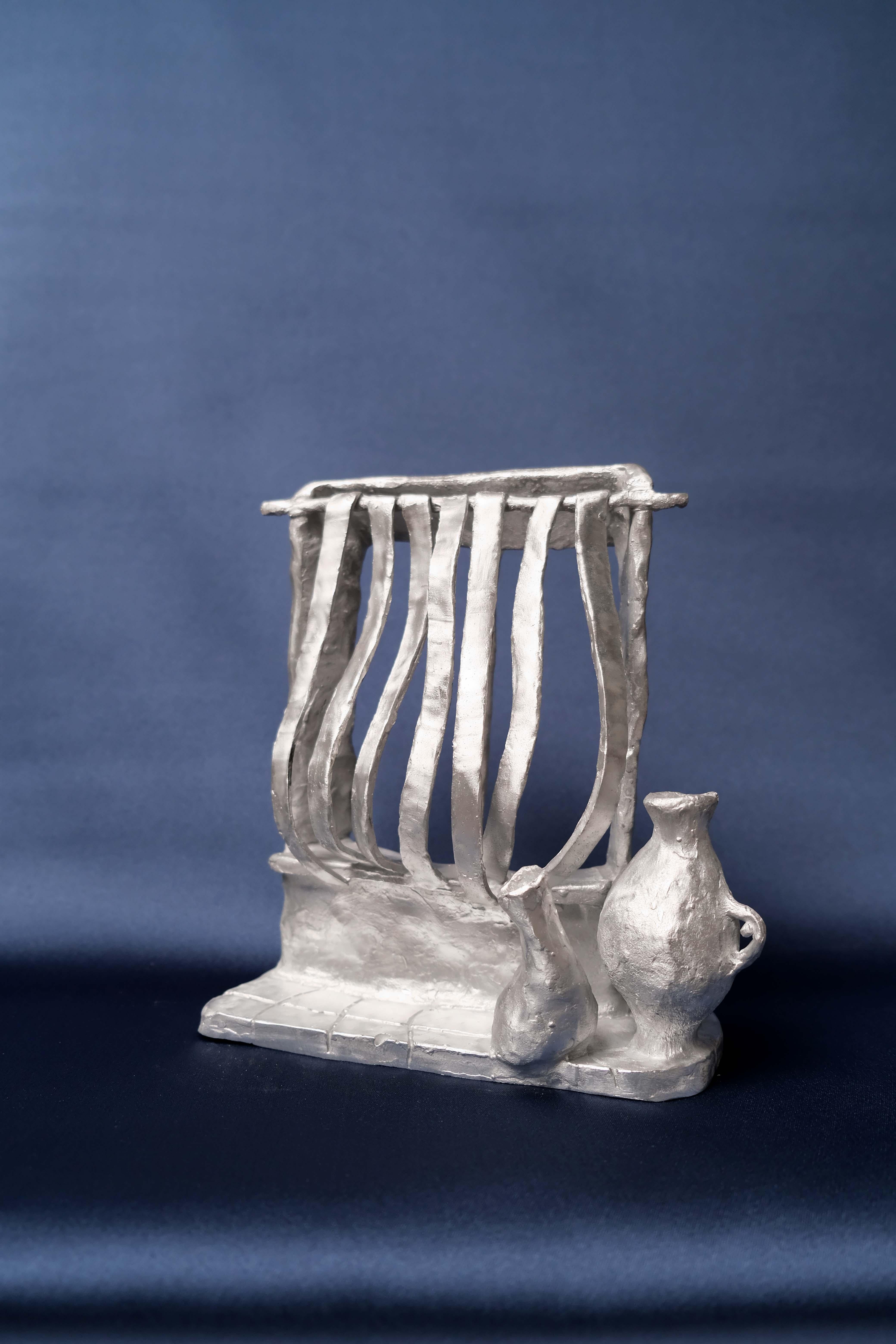 Cast Handmade Aluminium cast standing sculpture depicting 'Vent Du Sud' For Sale