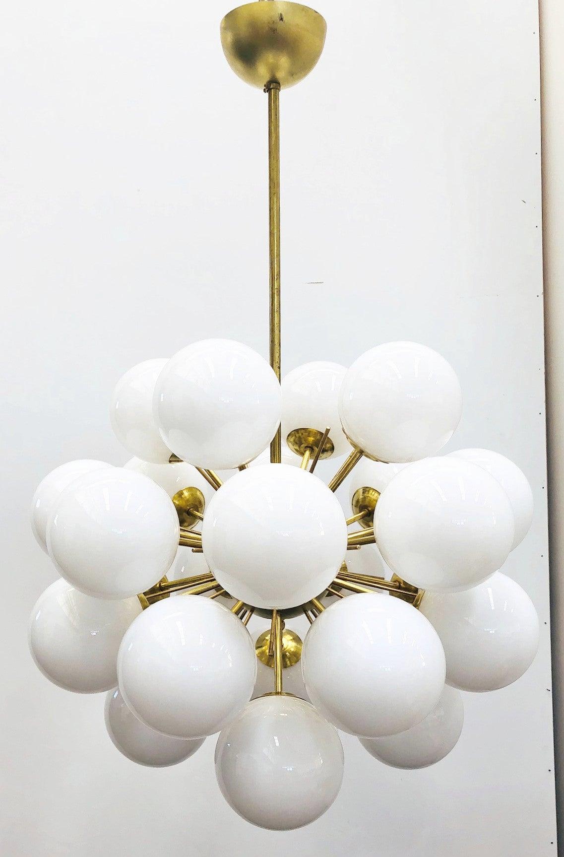 Italian sputnik chandelier with 24 Murano glass globes mounted on brass frame / Designed by Fabio Bergomi for Fabio Ltd / Made in Italy
24 lights / E12 or E14 type / max 40W each
Diameter: 28 inches / Height: 39 inches including rod and canopy
Order