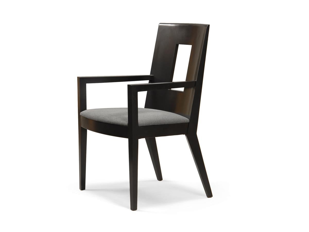 Solid maple espresso exposed wood frame with upholstered seat cushion. The opening in the backs make it easy to pull out and move around. Seat cushion can be upholstered in either leather of fabric. See the Ventra side chair, dining table, and