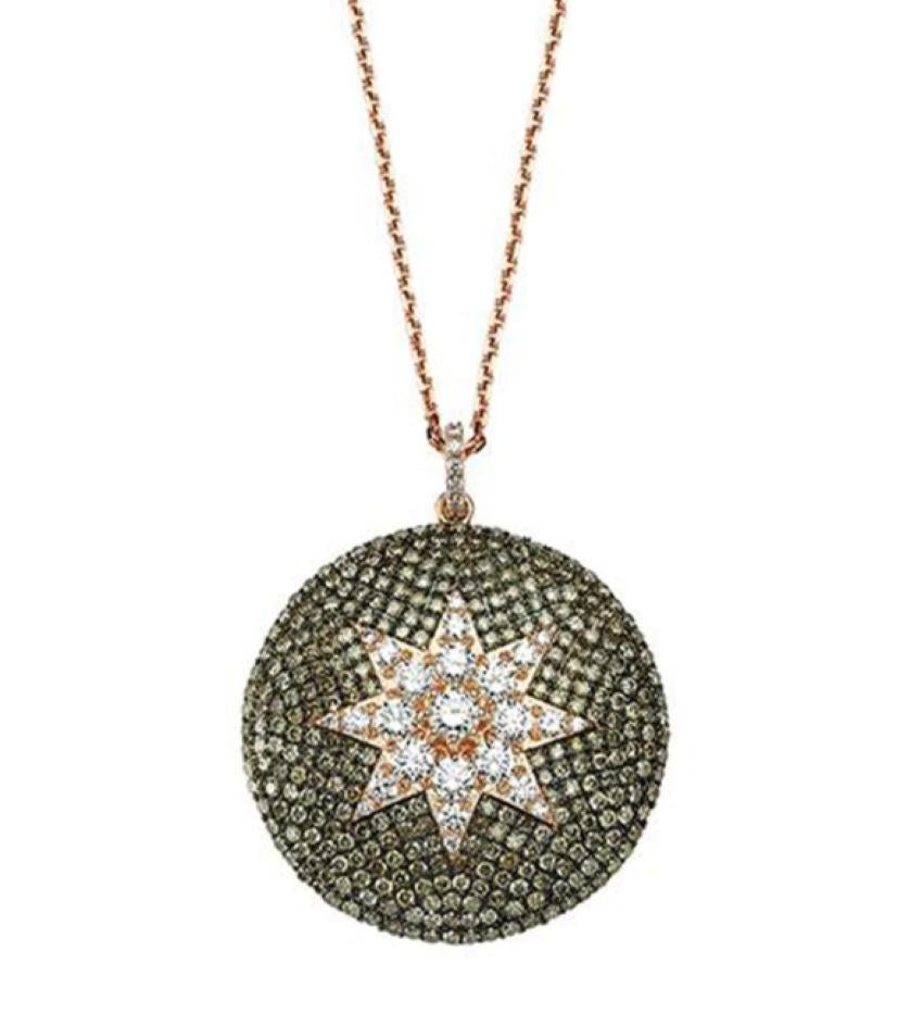 Crafted from 14K Rose Gold and adorned with a 1.28 Ct H-VS1 Diamond and a 2.45 Ct Brown Diamond, this piece measures 3 cm in diameter and comes with an adjustable 42+5 cm chain.

The eight-rayed Venus star, emblematic of the goddess Ishtar