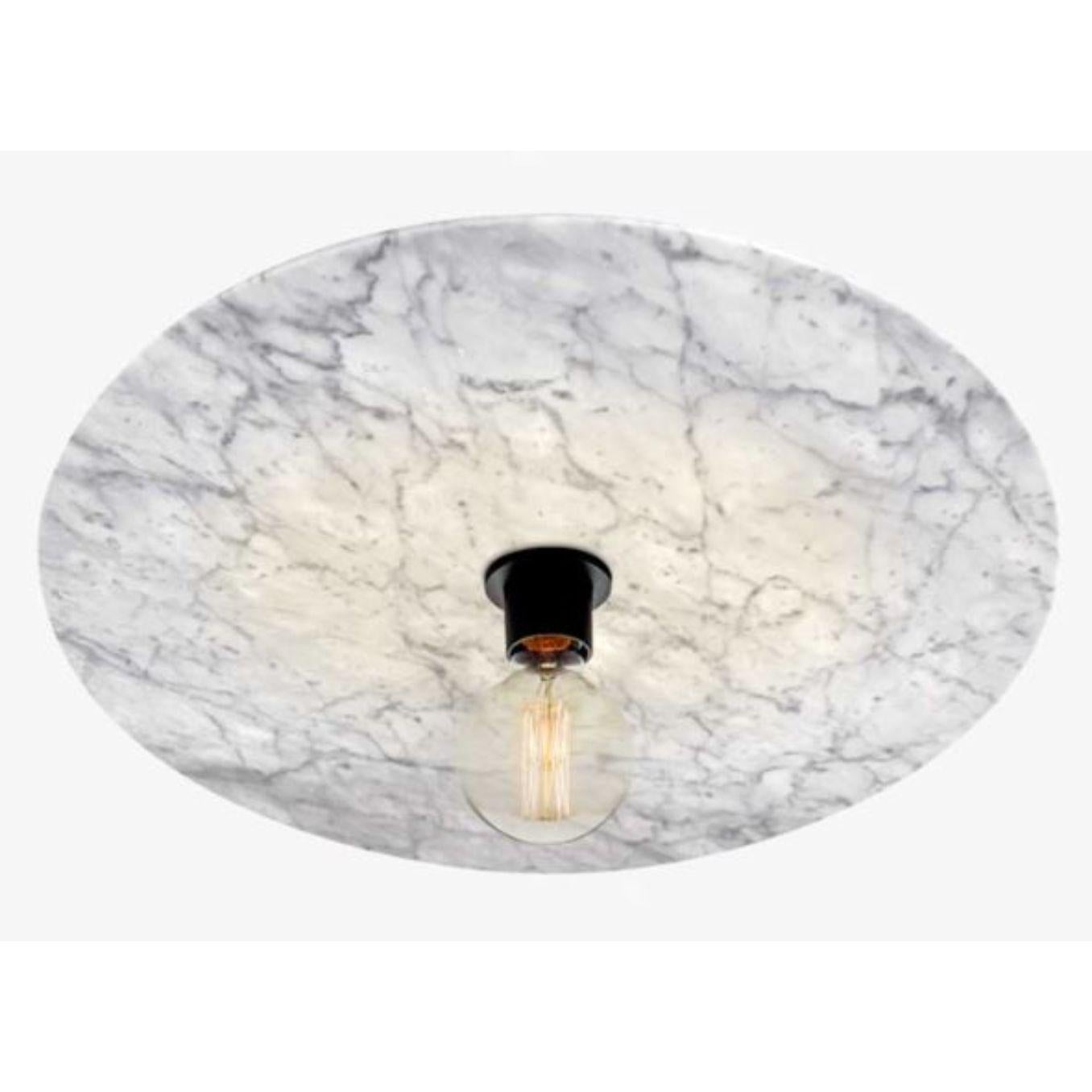 Venus ceiling light by RADAR
Design: Bastien Taillard
Materials: White Carrara marble, matte black thermolacquered metal structure, matt white thermo lacquered front ring.
Dimensions: D 60 x H 10 cm

All our lamps can be wired according to each