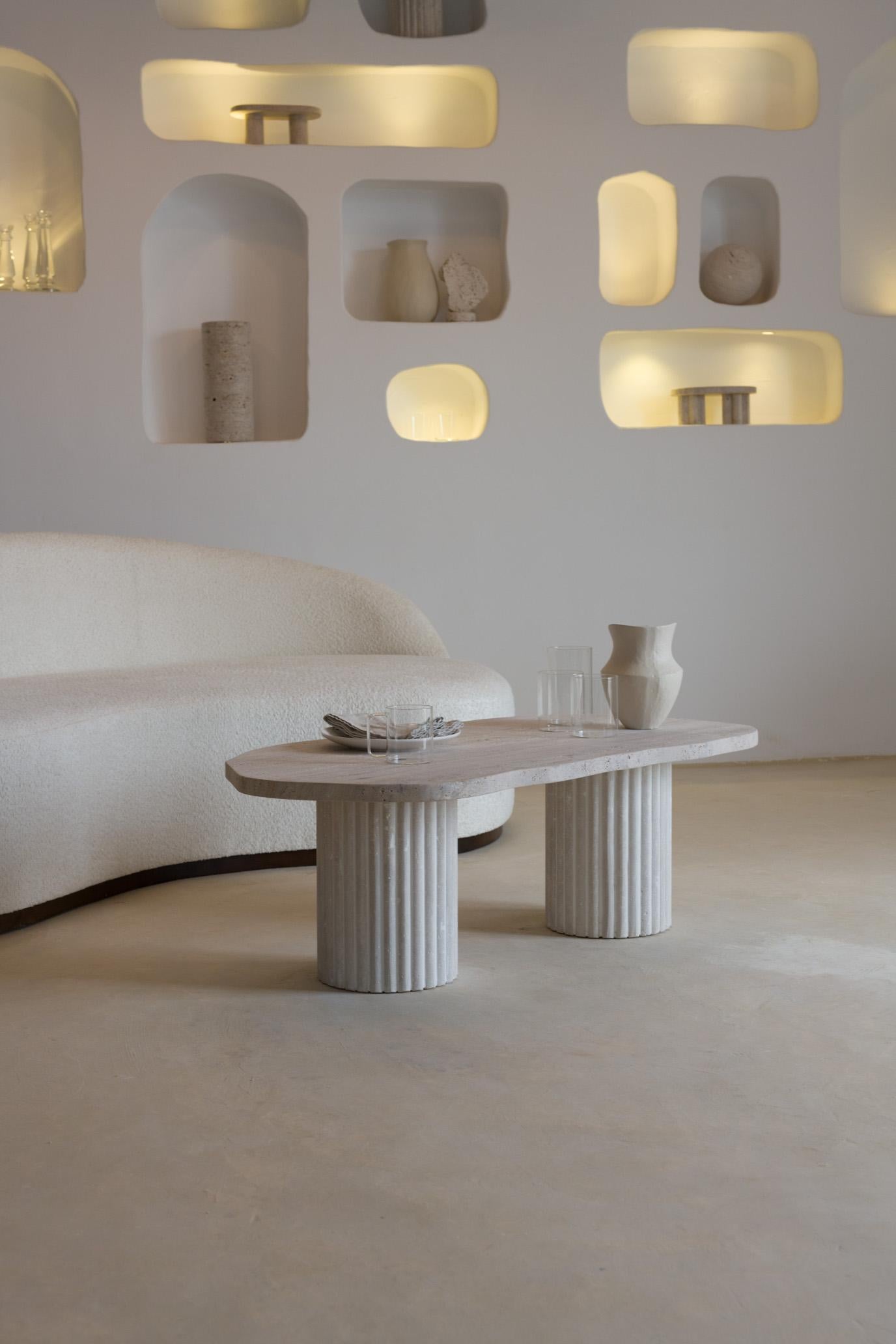 Venus Lizea 120 Travertine Decorative Low Coffee Table by Beije Avenue
Dimensions: D 120 x W 160 x H 40 cm. 
Materials: Travertine.

Available in different size options. Please contact us.

A highly prized rock during Antiquity, Travertine displays