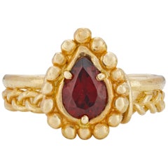 Venus Ring, 18 Karat Yellow Gold with Garnet