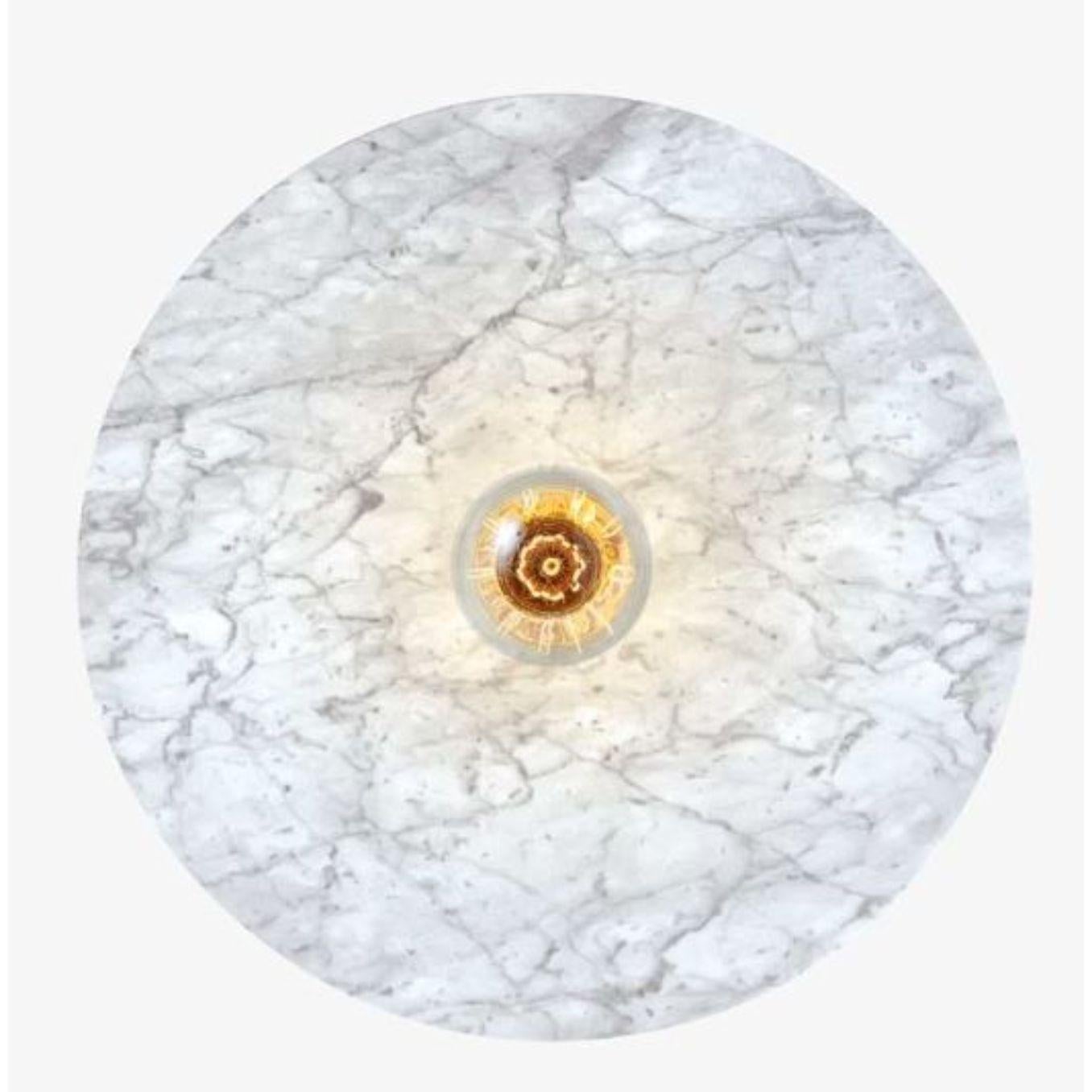 Venus wall light by RADAR.
Design: Bastien Taillard
Materials: White Carrara marble, matte black thermolacquered metal structure, matt white thermo lacquered front ring.
Dimensions: depth 10 x diameter 60 cm.

All our lamps can be wired