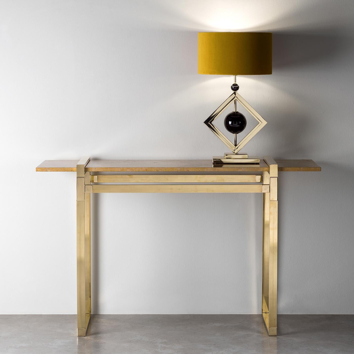 This sculptural work of art functions also as a console to add an opulent and Art Deco-inspired accent to a refined interior. The structure is entirely crafted of brass rods that connect forming a striking silhouette. A top in Imperial gold marble