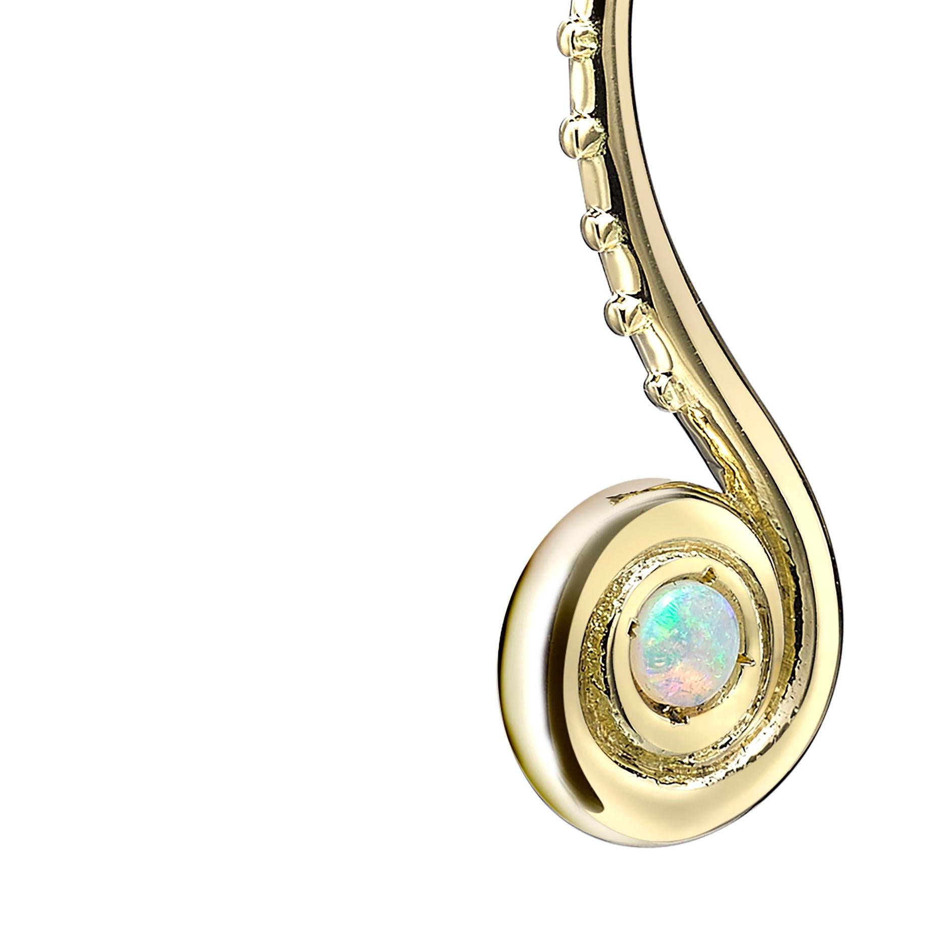 18k Yellow Gold approx. 5.05gr & 2 White Opals 0.15ct

The Pharaonys pieces are inspired by a type of cuttlefish that transforms and changes shape and colour. The pieces have tribal design elements to them and the spiral shapes are also a symbolic