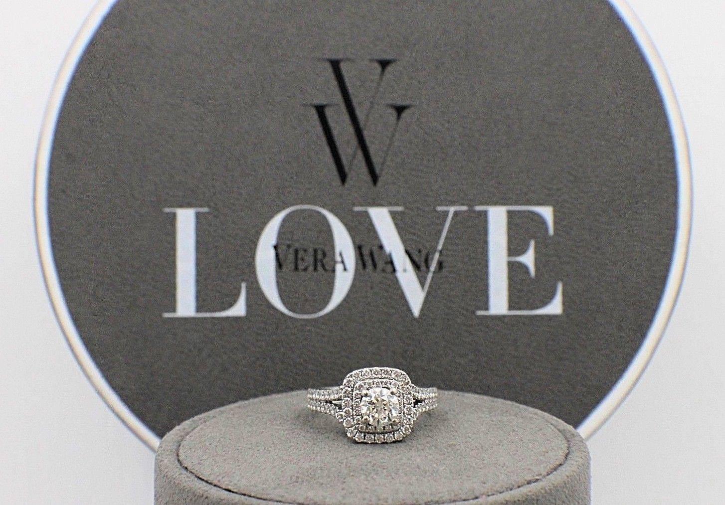 VERA WANG BRIDAL LOVE COLLECTION
Style:  Split Shank Halo Diamond Engagement Ring 1 1/2 TCW
Sku Number:  19993147
Metal:  14KT White Gold
Size:  5 - sizable 
Total Carat Weight:  1 1/2 TCW
Center Diamond Shape:  Round Brilliant Diamond 3/4 CTS H - I