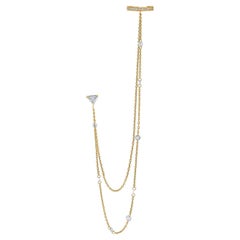 Vera Belleza's  18k gold ear cuffs, diamond shaped studs & dangling rose cuts