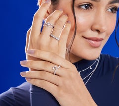 Vera Belleza's Heart shapped diamond in 18k gold with dangling briolette drops