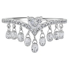 Vera Belleza's Heart shapped diamond in 18k gold with dangling briolette drops