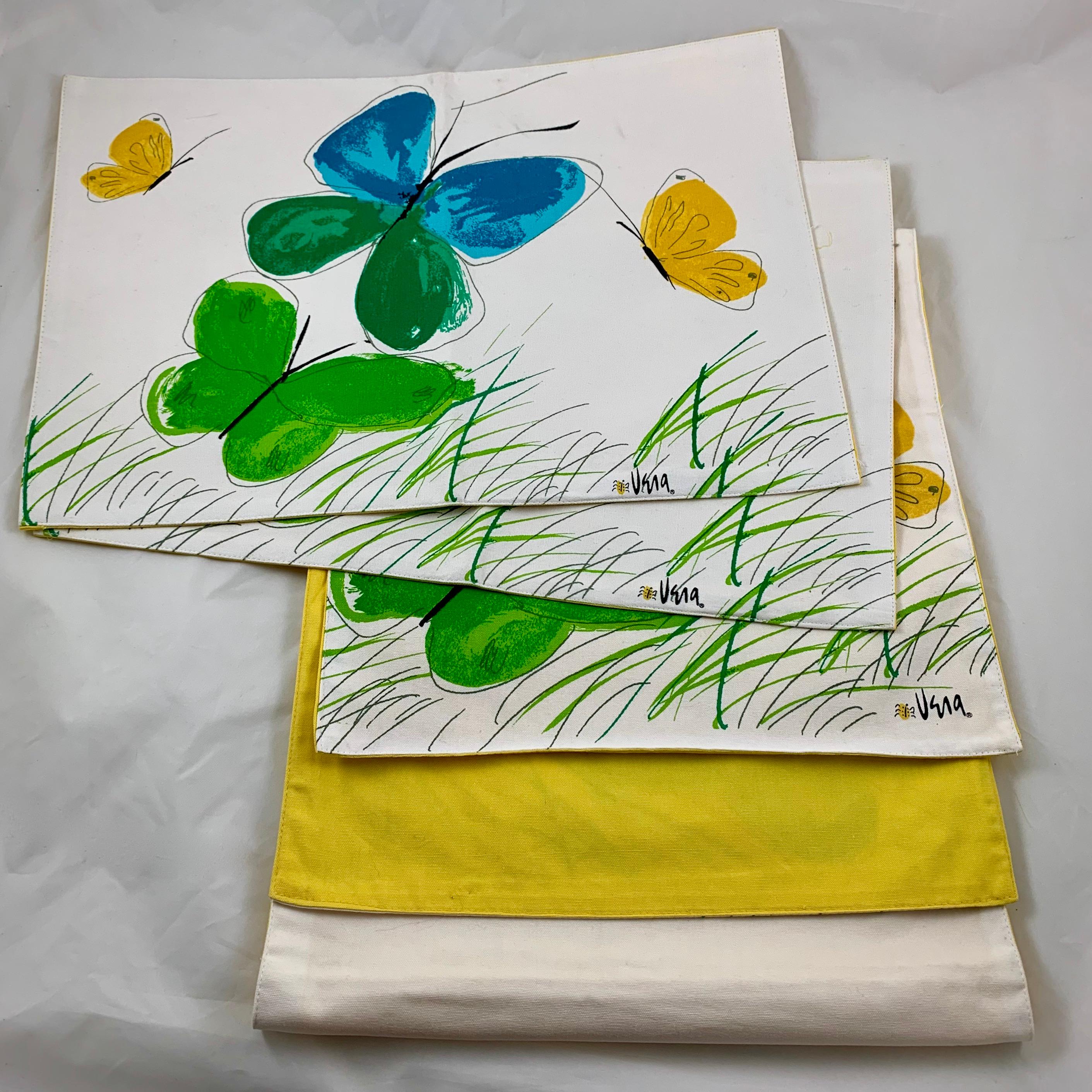 From the studio of the prolific and wildly popular midcentury designer and artist, Vera Neumann, a three-piece set, a table runner with two place mats, circa mid-1960s to early 1970s.

The all-cotton permanent pressed cloth is silkscreened in a