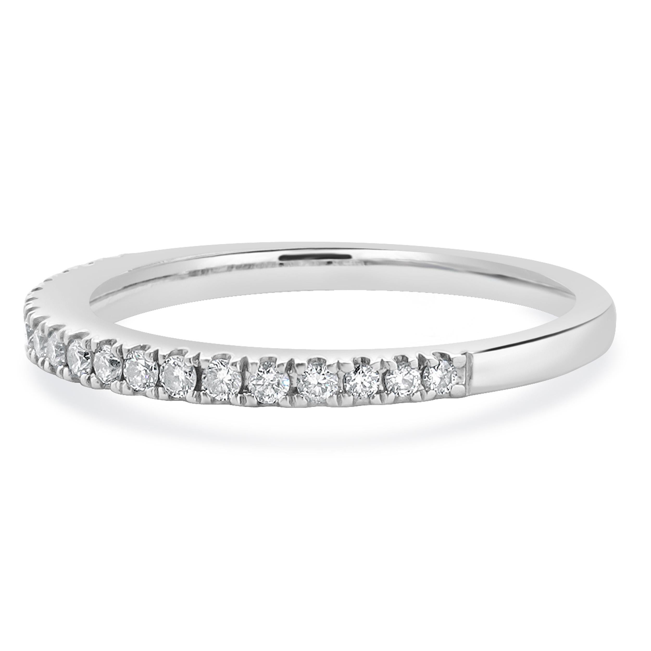 Designer: Vera Wang
Material: 14K white gold
Diamond: 23 round brilliant cut = 0.25cttw
Color: I
Clarity: I2
Ring size: 5.5 (please allow two additional shipping days for sizing requests)
Weight: 2.14 grams
