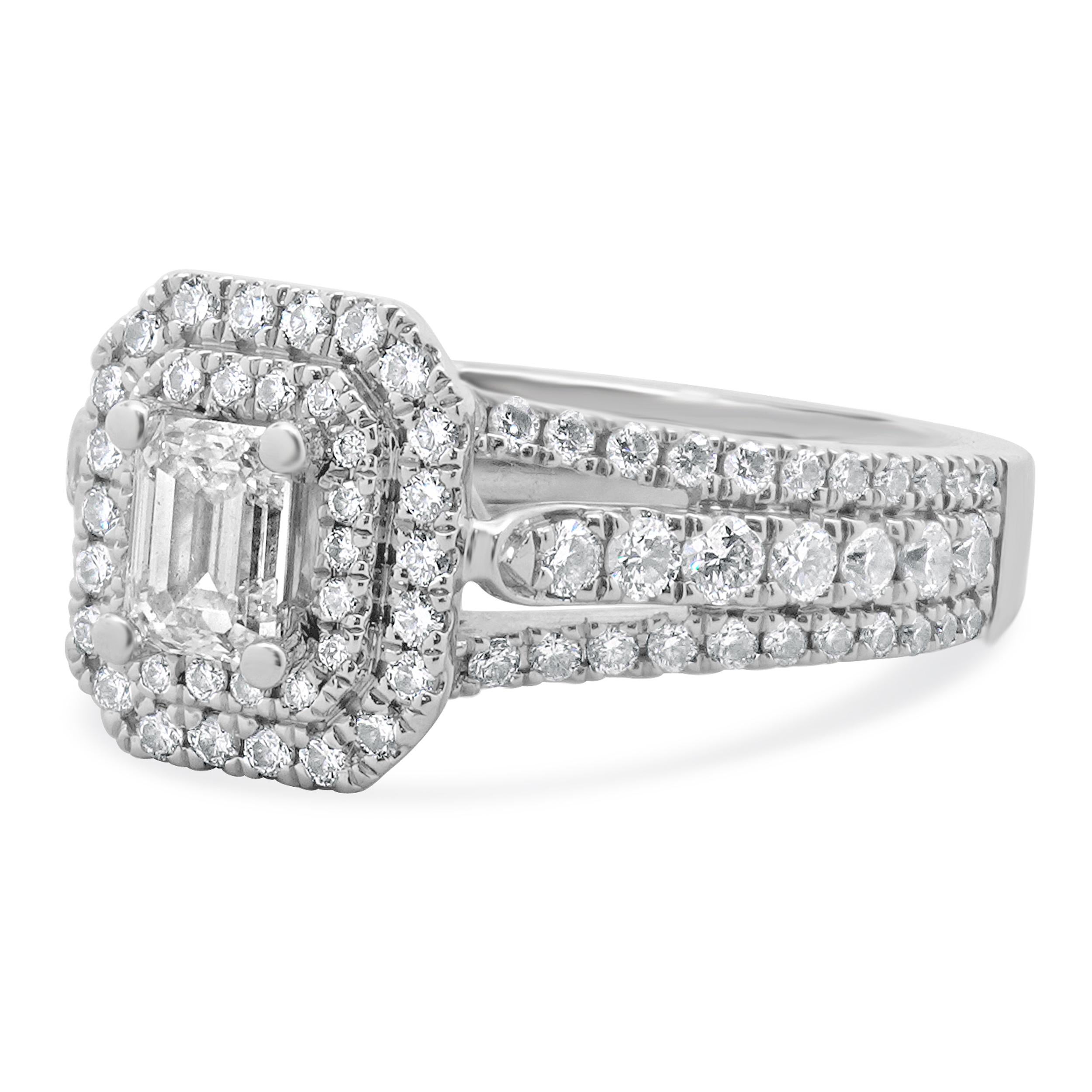 Designer: Vera Wang
Material: 14K white gold
Center Diamond: 1 emerald cut = 0.36ct
Color : H
Clarity : VS1
Diamond: 102 round brilliant cut = 0.60cttw
Color : G/H
Clarity : SI1-2
Size: 6.75 complimentary sizing available 
Weight: 6.25 grams
