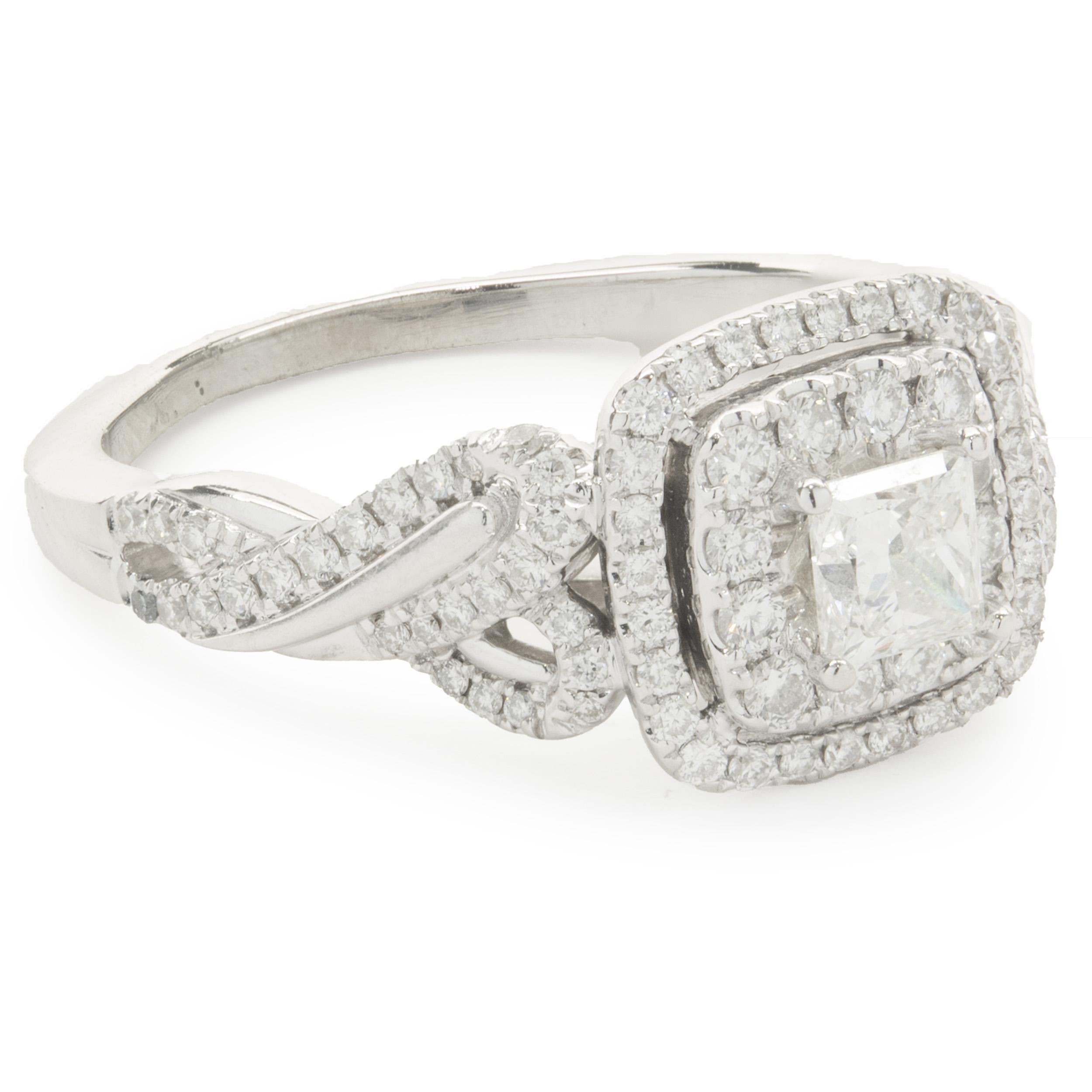 Designer: Vera Wang
Material: 14K white gold
Diamond: 1 princess cut = 0.40ct
Color: G
Clarity: SI1 
Diamond: round brilliant cut = 2.99cttw
Color: G
Clarity: VS2
Ring Size: 9.5 (please allow two additional shipping days for sizing