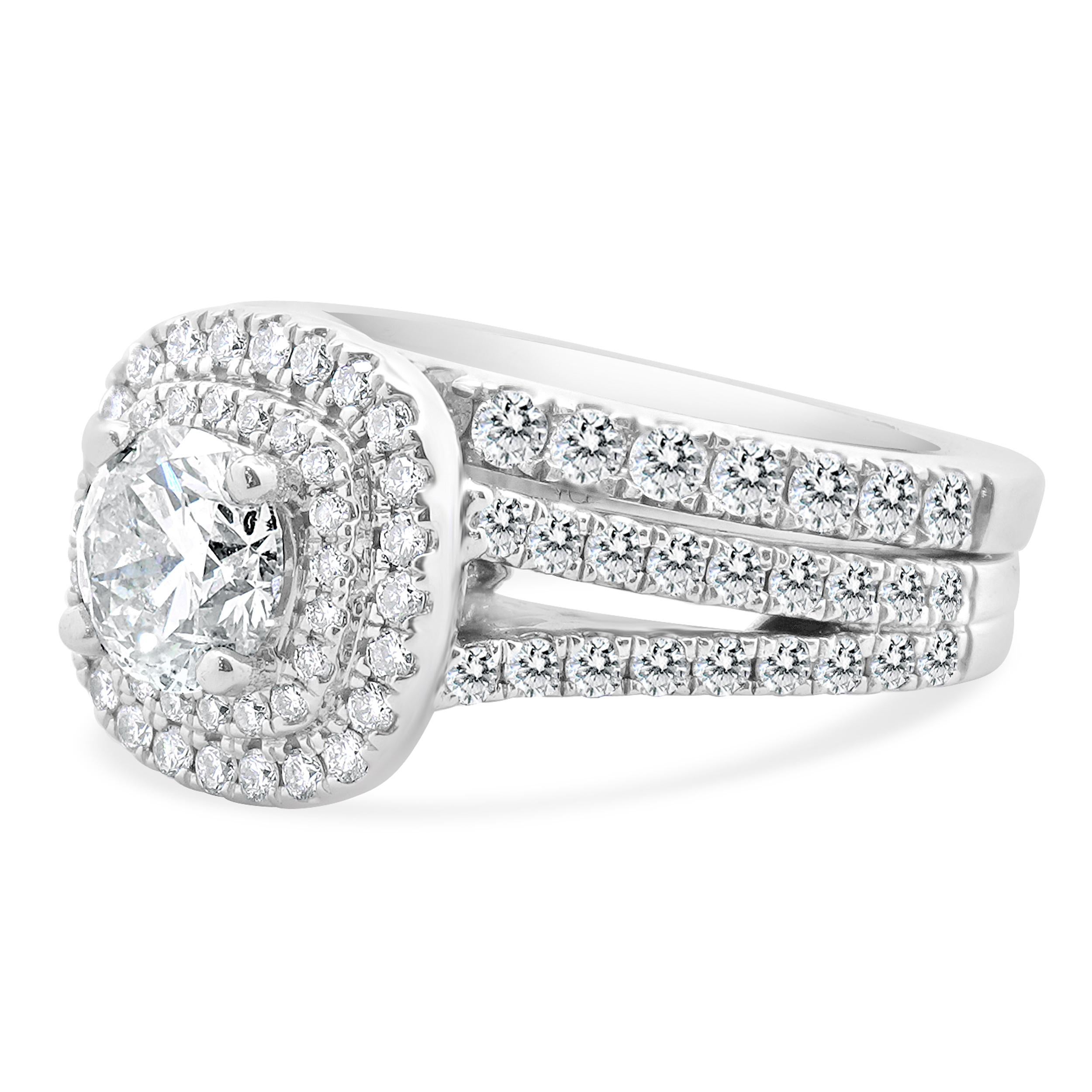 Designer: Vera Wang
Material: 14K white gold
Center Diamond: 1 round brilliant cut = 0.90ct
Color : J
Clarity : I1
Diamond: 117 round brilliant cut = 1.02cttw
Color : H-I
Clarity : SI2
Dimensions: ring top measures 12mm
Size: 5.75 complimentary