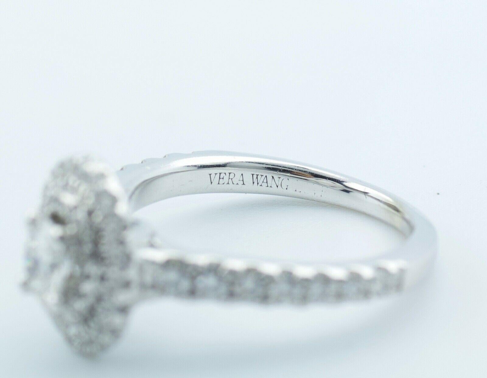 Vera Wang 14k White Gold White Gold Oval And Round Brilliant Cut Diamond Halo Engagement Ring

Ring Size 5

4.0 Grams

Oval And Round White Cut Diamond 0.75 Carats Total Weight

Color: G Clarity: Vs2

This is a beautiful white gold oval shaped