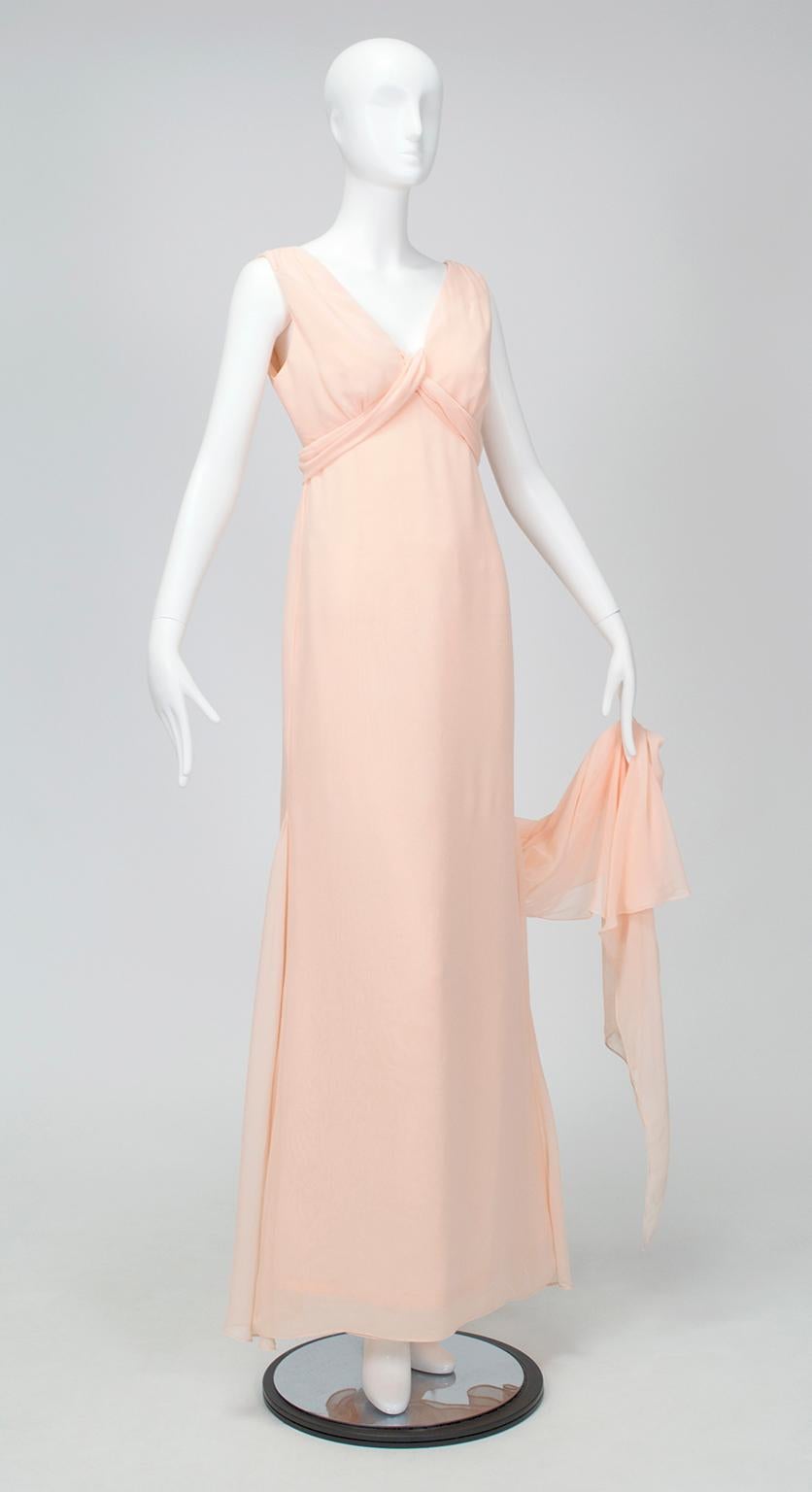 A gown so Neoclassical it looks as if it came right off a Greek statue, with floating sash ties that permit endless styling variations. Neither pink nor peach, this gown is a flattering shade of blush perfect for brides, bridesmaids or black tie. In