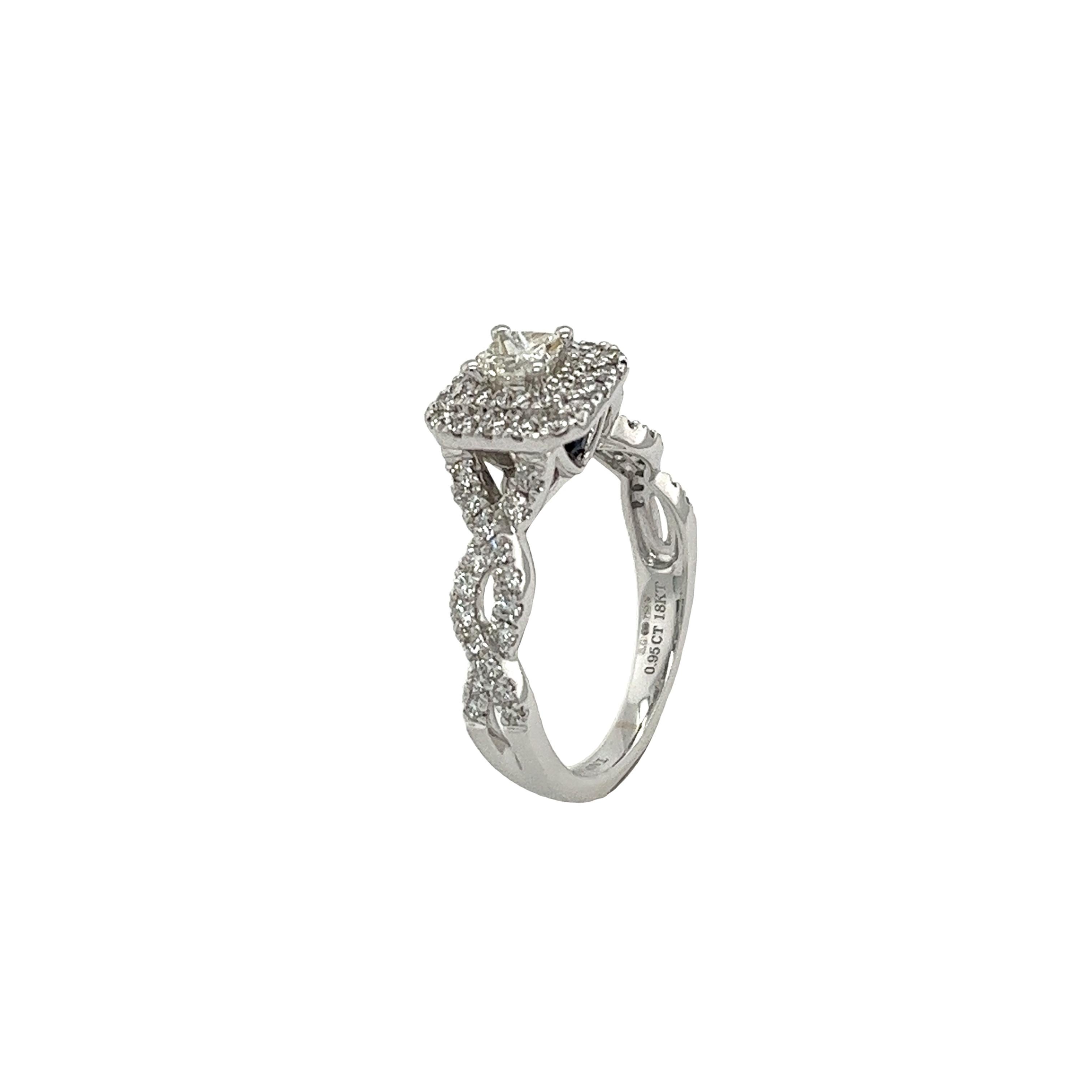 This dazzling Vera Wang Love cluster ring with 0.95ct of natural diamonds, making it the perfect style for a engagement ring. 
The ring is made of 18ct white gold.
Total Diamond Weight: 0.95ct
Diamond Colour: H
Diamond Clarity: SI
Width of Band: