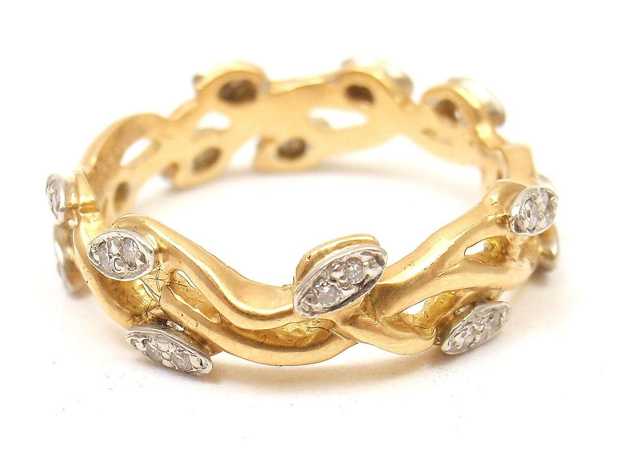 18k Yellow Gold Fine Jewelry Diamond Vine Motif Band by Vera Wang. 
With 30 diamonds, approx. 30 ctw, set in platinum
Details: 
Size - 6.75
Width: 5.5mm
Weight: 4 grams
Stamped Hallmarks: Vera Wang 750
*Free Shipping within the United States*
YOUR