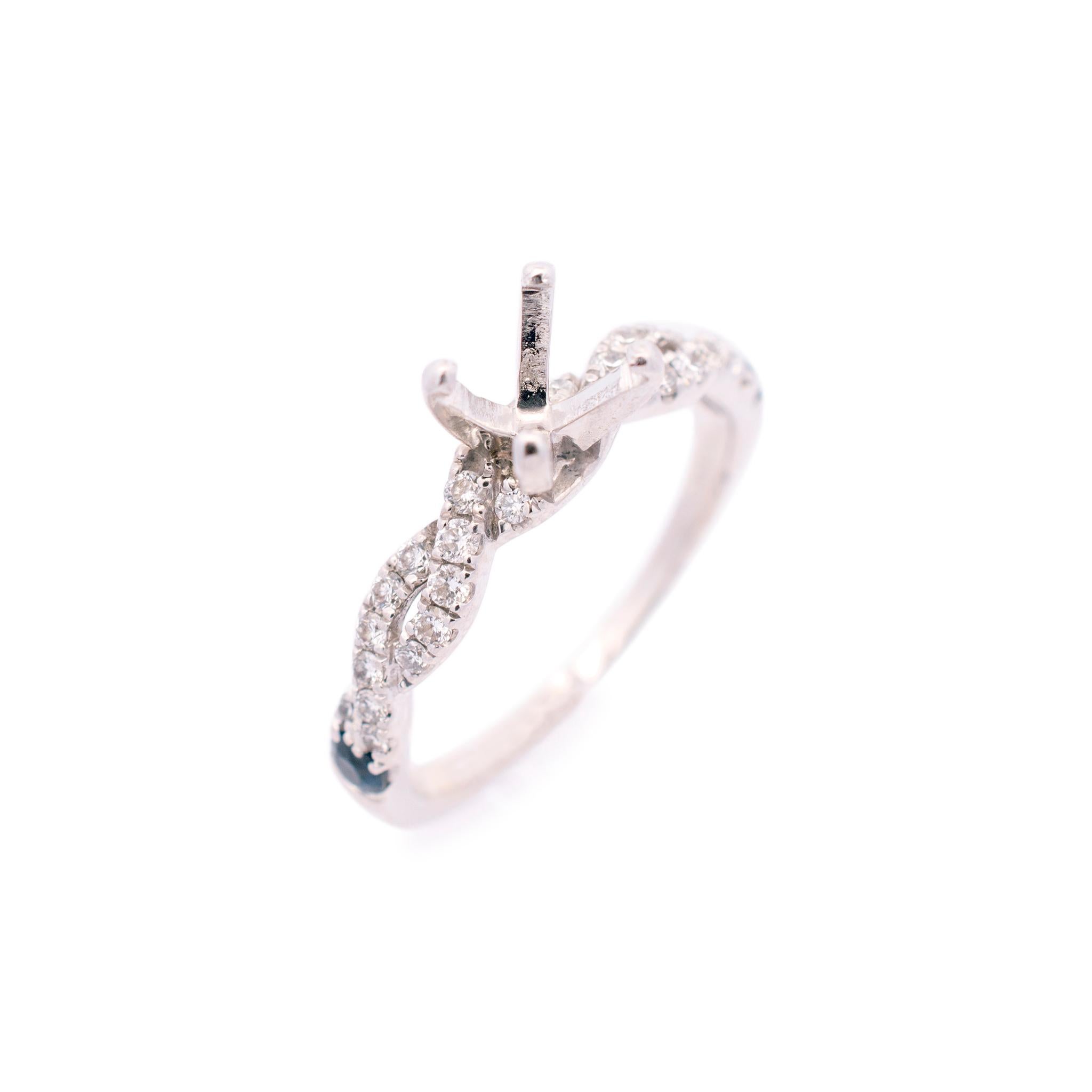 Brand: Vera Wang

Gender: Ladies

Metal Type: 14K White Gold

Size: 8

Shank Width: 2.80mm

The semi mount can accommodate a round or cushion shaped stone with a diameter between 5.90mm to 6.50mm.

Weight: 3.82 grams

Ladies 14K white gold diamond