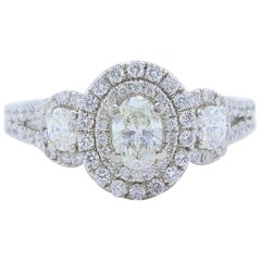 Used Vera Wang Love 1 1/2 Carat Oval Three-Stone Diamond Halo Ring 14 Karat WG