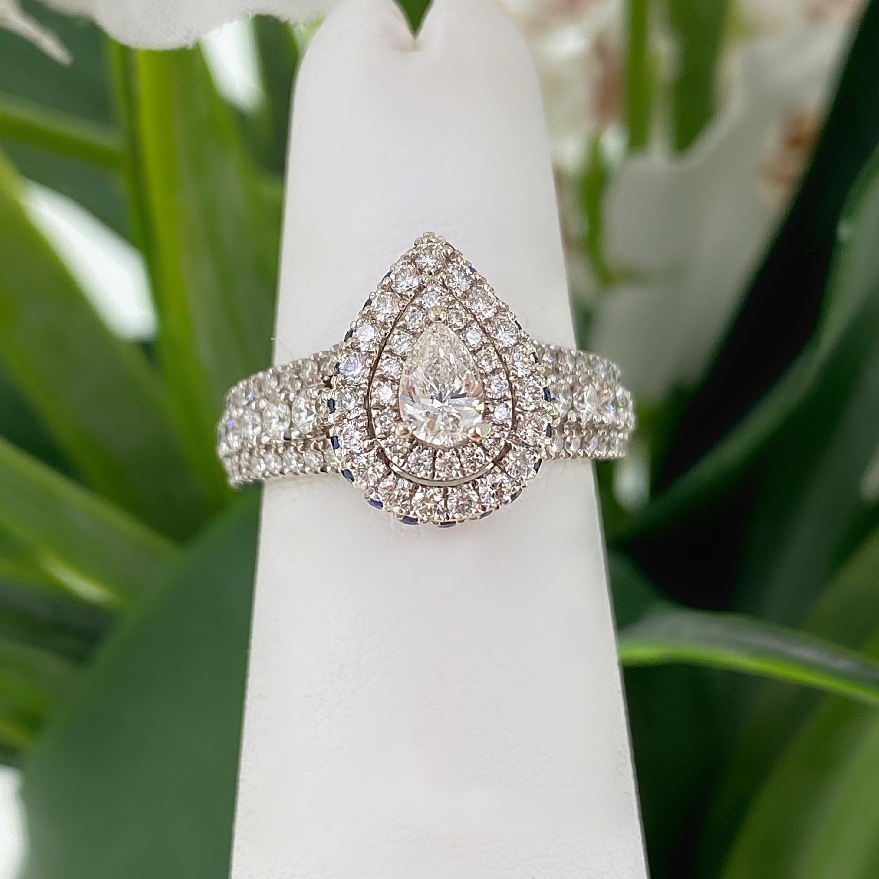 Vera Wang LOVE Collection Double Halo Engagement Ring
Style:  20332385
Metal:  14kt White Gold
Size / Measurements:  4.75 - sizable
TCW:  1.00 tcw
Main Diamond:  Pear Shape Diamond 1/4 cts
Color & Clarity:  I / SI2
Accent Diamonds:   95 Round