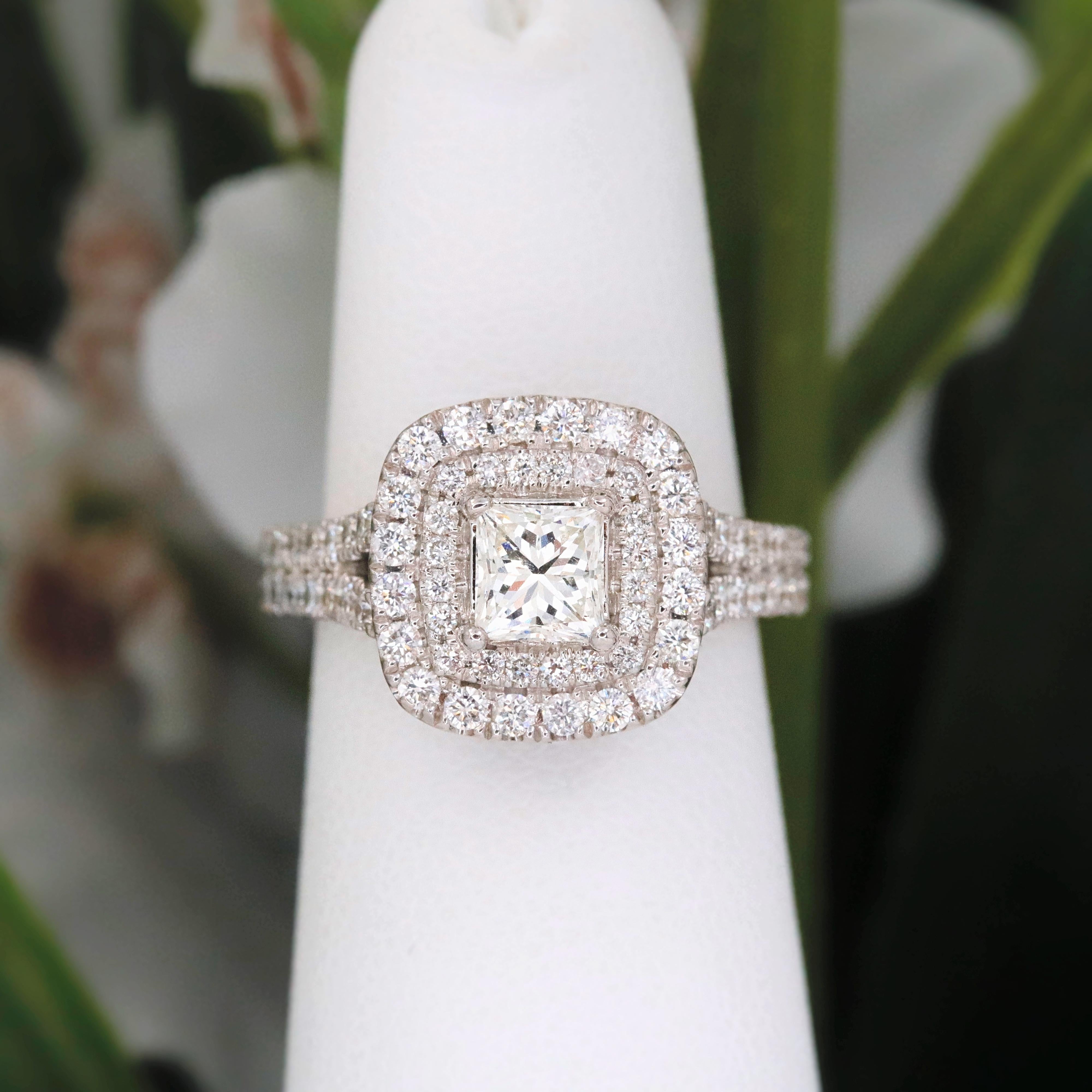 Vera Wang Love Collection Diamond Engagement Ring 

Style: Frame Split-Shank 
Metal: 14 kt White Gold
Size: 6 - sizable
Total Carat Weight: 1.50 tcw
Diamond Shape: Princess-Cut Diamond 0.50 cts
Diamonds Color & Clarity: I color, SI2 clarity
Accent