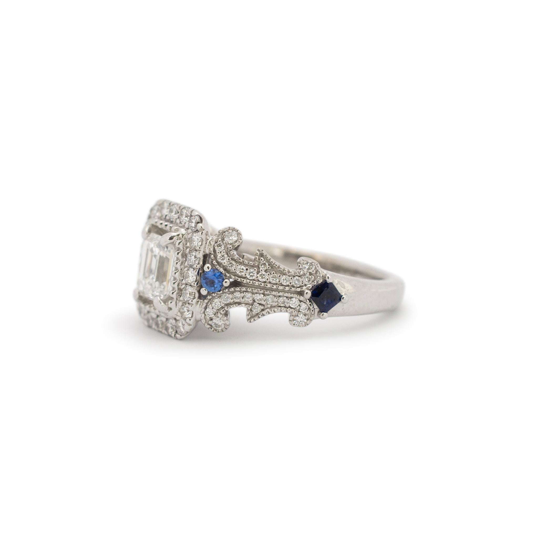 Gender: Ladies

Metal Type: 14K White Gold

Size: 5.5

Weight: 7.00 grams

Ladies 14K white gold diamond and sapphire engagement halo ring with a half round shank. Engraved with 