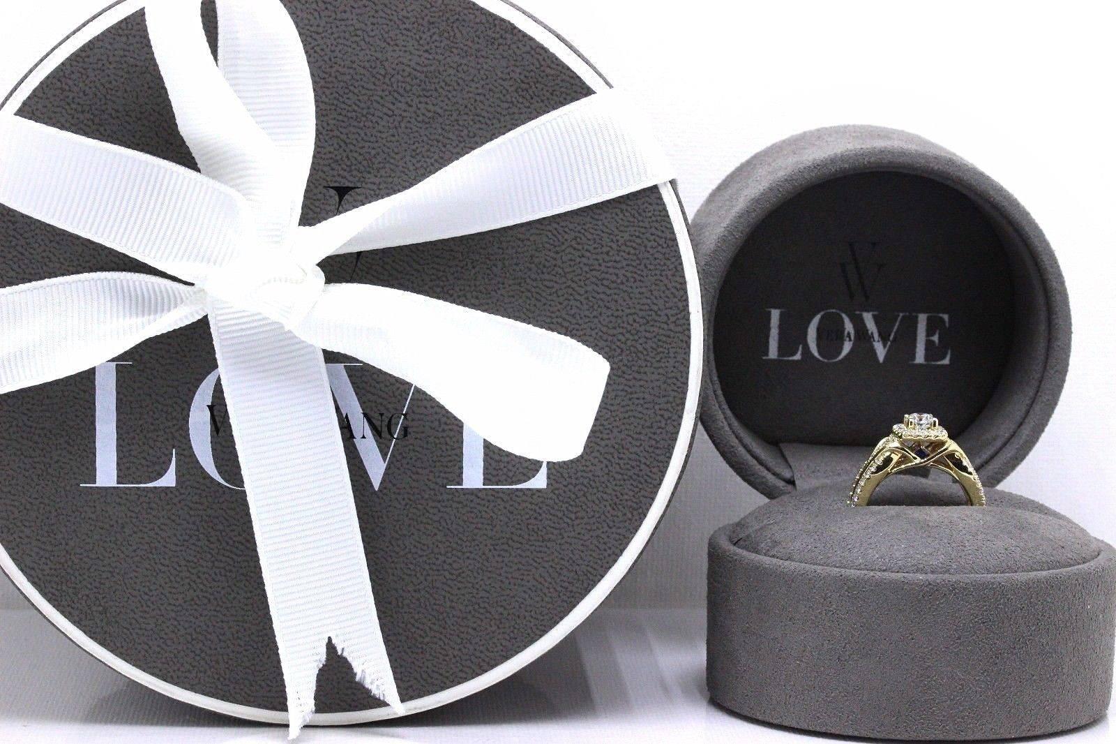 VERA WANG LOVE COLLECTION 
Style:  1 TCW Diamond Frame Split Shank Engagement Ring
Sku Number:  19878511
Metal:  14KT Yellow Gold
Size:  6 - Sizable
Total Carat Weight:  1.00 TCW
Diamond Shape:  Round Diamond 0.50 CTS
Diamond Color & Clarity:  I /