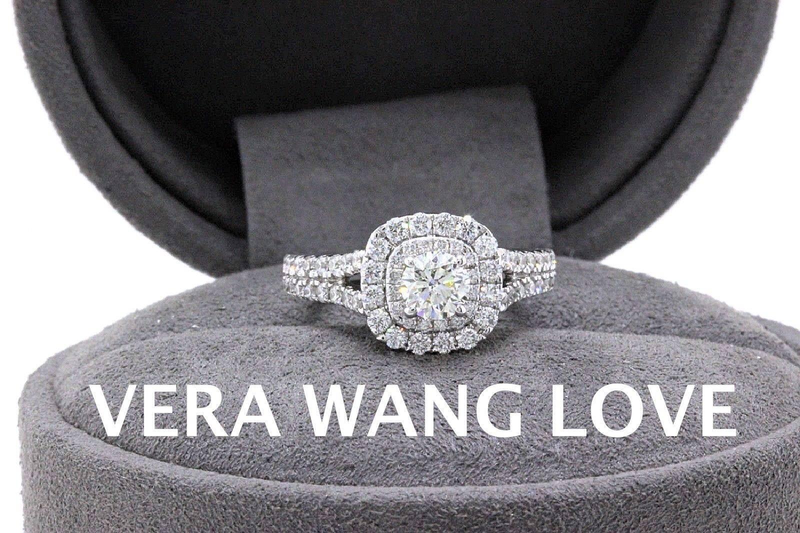 VERA WANG LOVE COLLECTION 
Style:  1 1/2 TCW Diamond Frame Split Shank Engagement Ring
Sku Number:  18628156
Metal:  14KT White Gold
Size:  5 - Sizable
Total Carat Weight:  1.50 TCW
Diamond Shape:  Round Diamond 0.50 CTS
Diamond Color & Clarity:  I