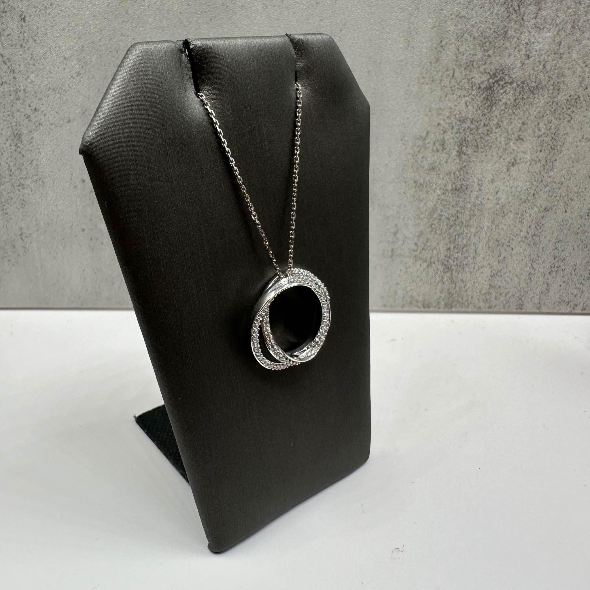 This Designer Vera Wang Love Diamond Necklace in 10kt white gold features 0.25ctw of natural HI I1 round diamonds, offering subtle sparkle in a sleek and elegant design. The length is adjustable up to 19 inches, making it versatile for different