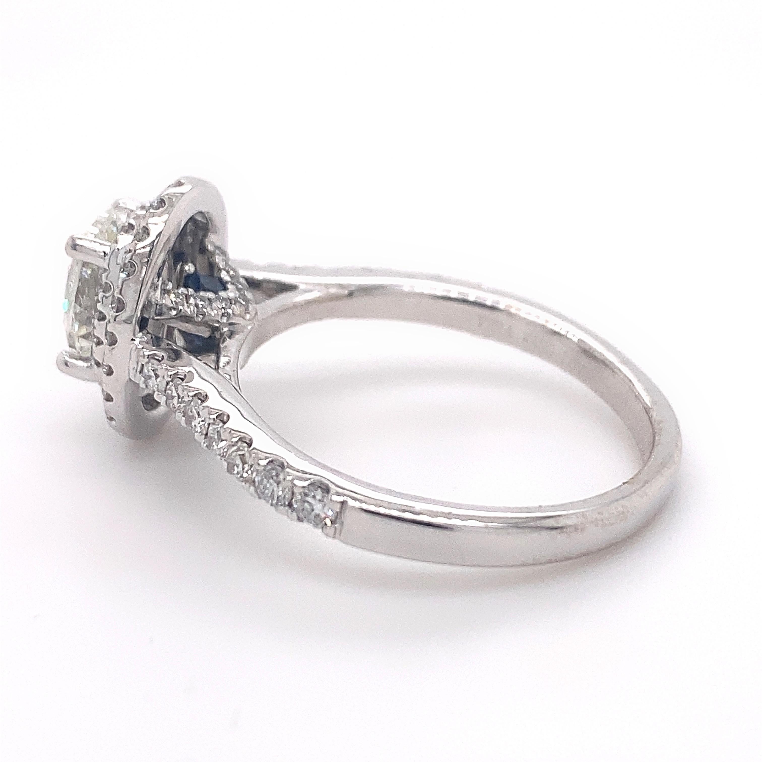 Vera Wang LOVE Collection Double Halo Engagement Ring
Style:  940400219
Metal:  14kt White Gold
Size / Measurements:   4.75 - sizable
TCW: 0.75 tcw / 7/8 ctw
Main Diamond:  Round Brilliant Diamond 1/3 cts
Color & Clarity:  I / SI2
Accent Diamonds:  