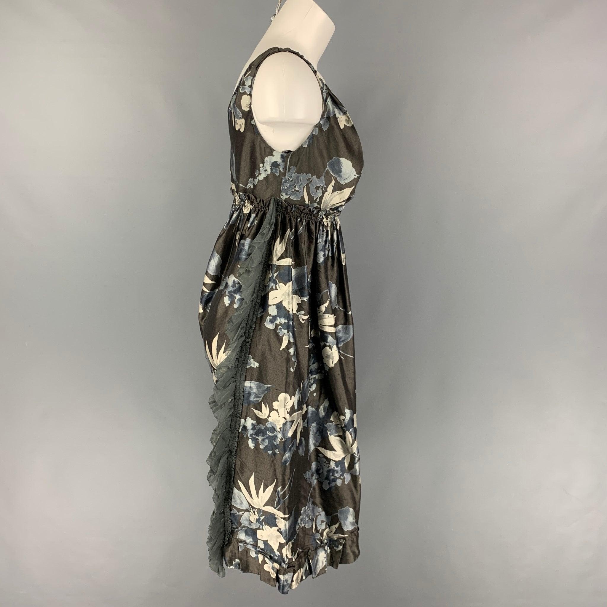 VERA WANG dress comes in a slate & cream floral silk featuring an a-line style, elastic detail, ruffled detail, and a side zipper closure. Made in USA.Very Good Pre-Owned Condition. 

Marked:   4 

Measurements: 
  Bust: 31 inches  Waist: 28 inches 