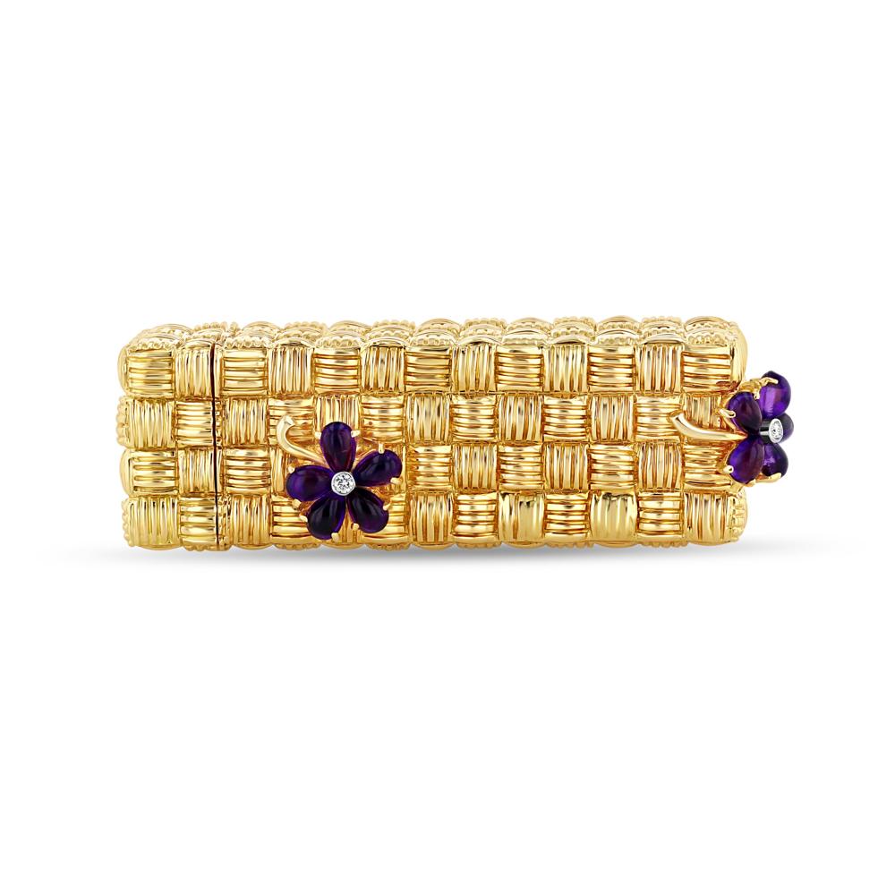 14k gold is worked into an intricate basket woven texture to coat this vintage Veradura lipstick holder. Atop the textured sides of the casing three pear cut amethyst and Old European diamond flowers lay like grape vines making for an overall